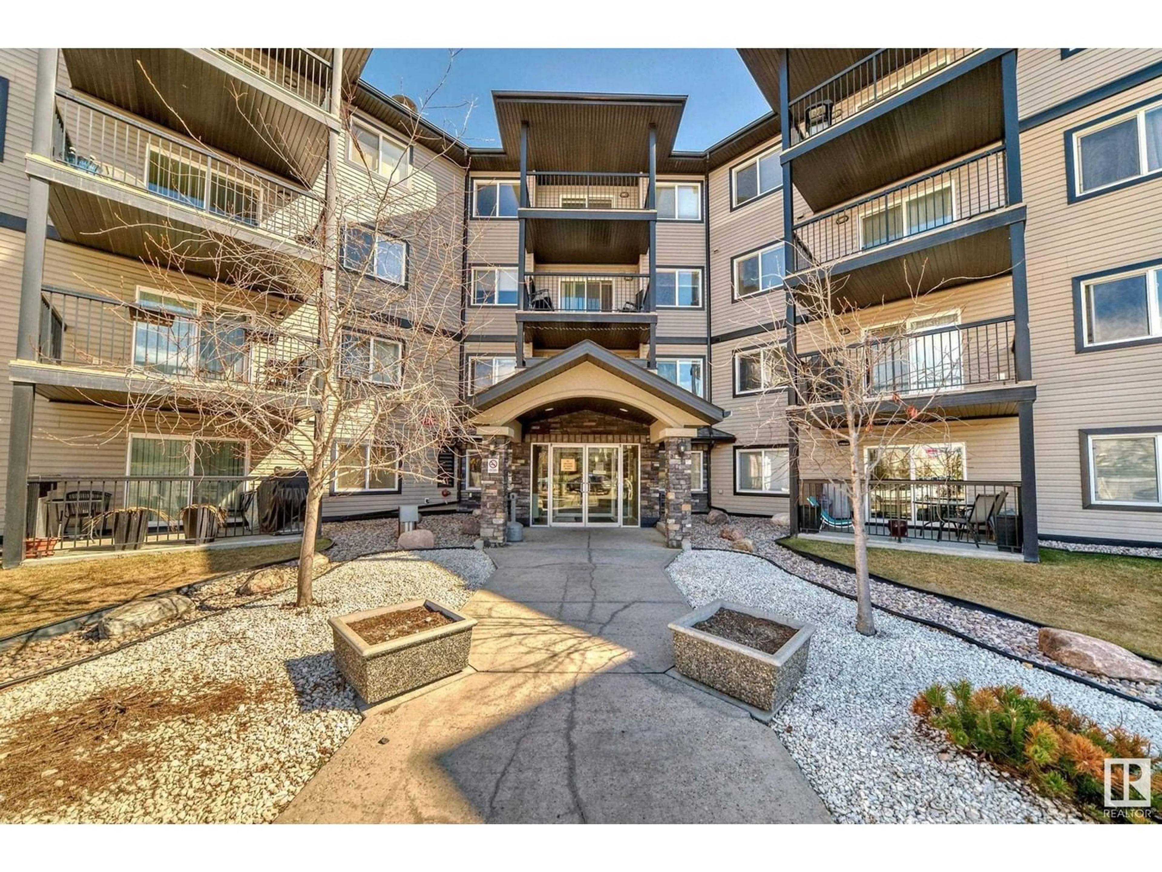 A pic from exterior of the house or condo for #421 5951 165 AV NW, Edmonton Alberta T5Y0J6