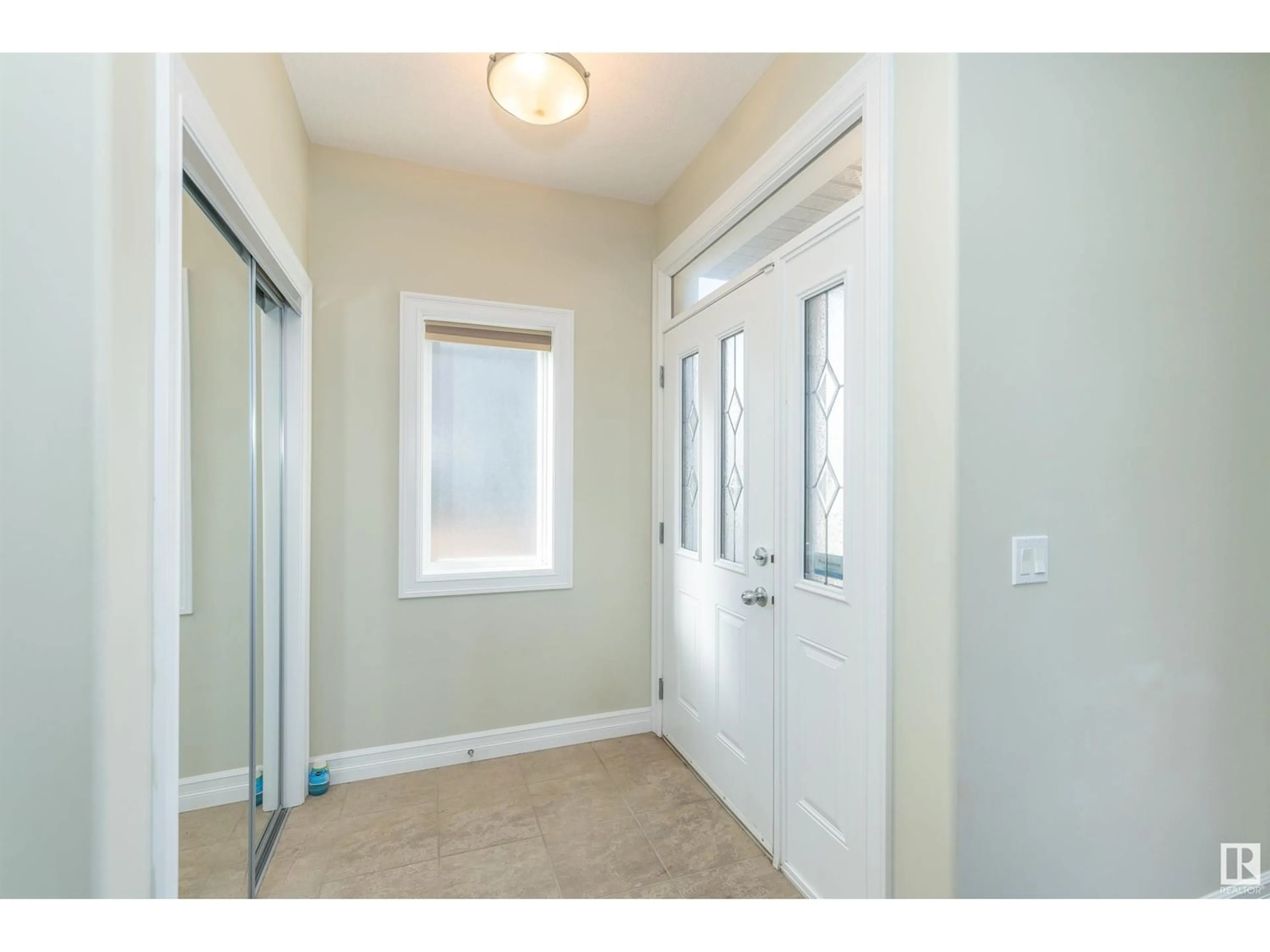 Indoor entryway for 8713 83 AV NW, Edmonton Alberta T6C1B2