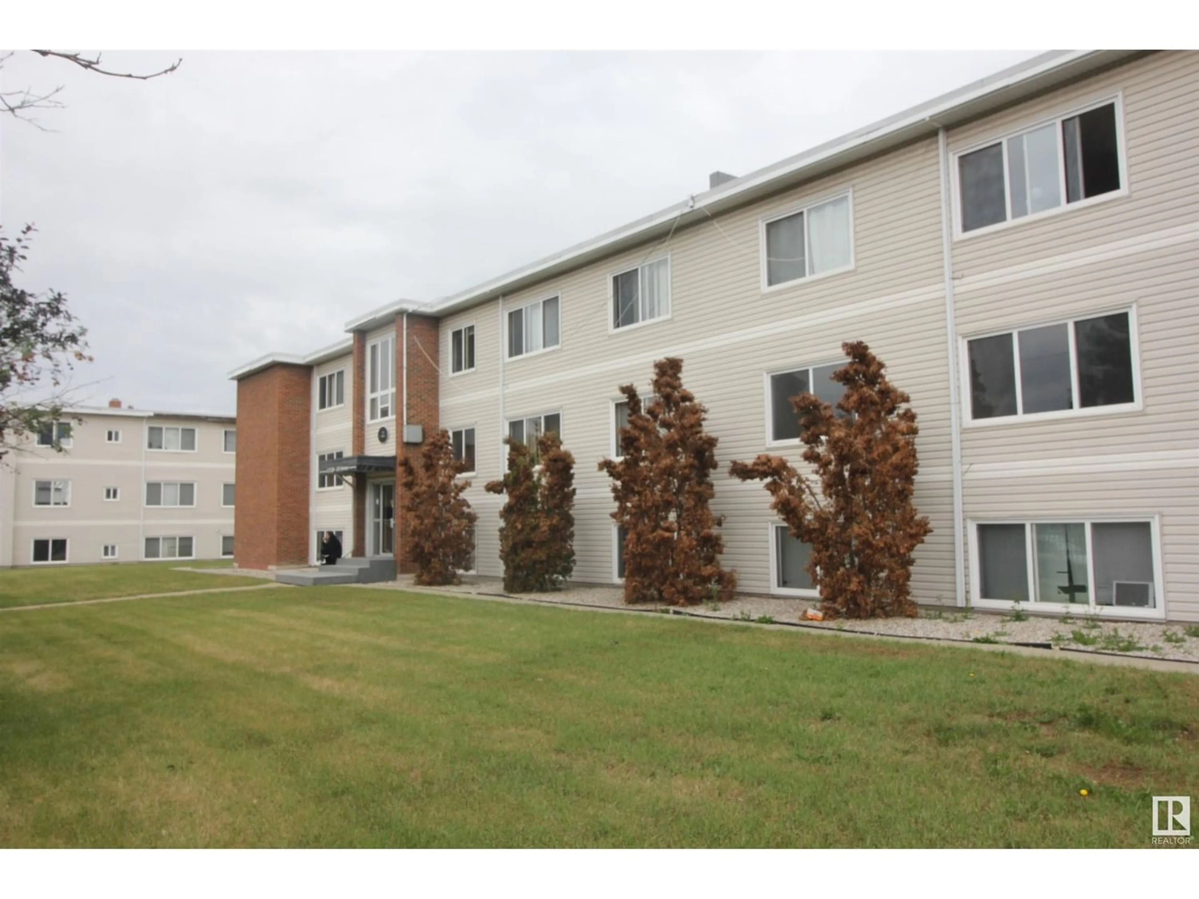 A pic from exterior of the house or condo for #7 12722A 118 AV NW, Edmonton Alberta T5L2L1