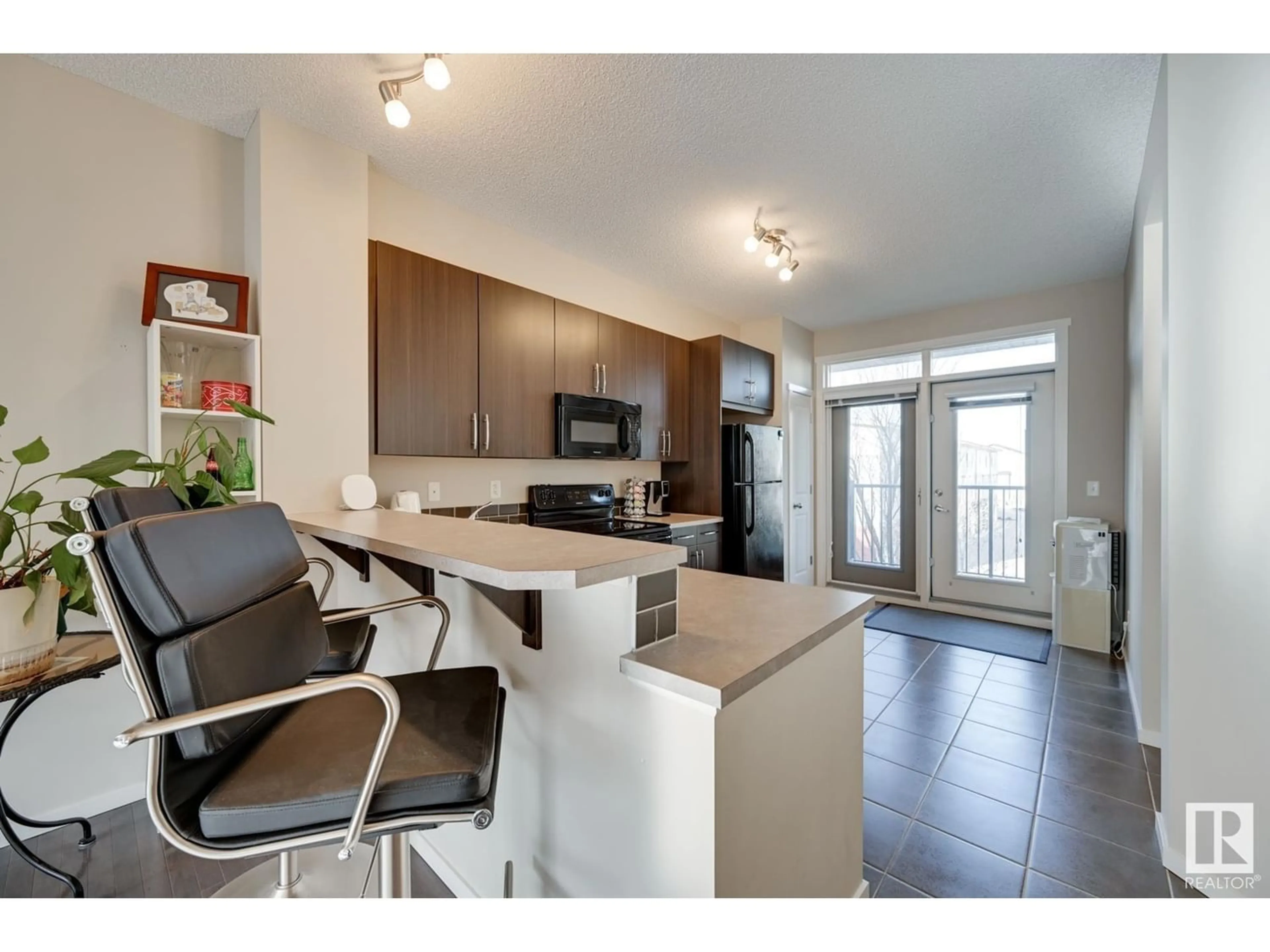 Contemporary kitchen for #73 603 WATT BV SW, Edmonton Alberta T6X0H4