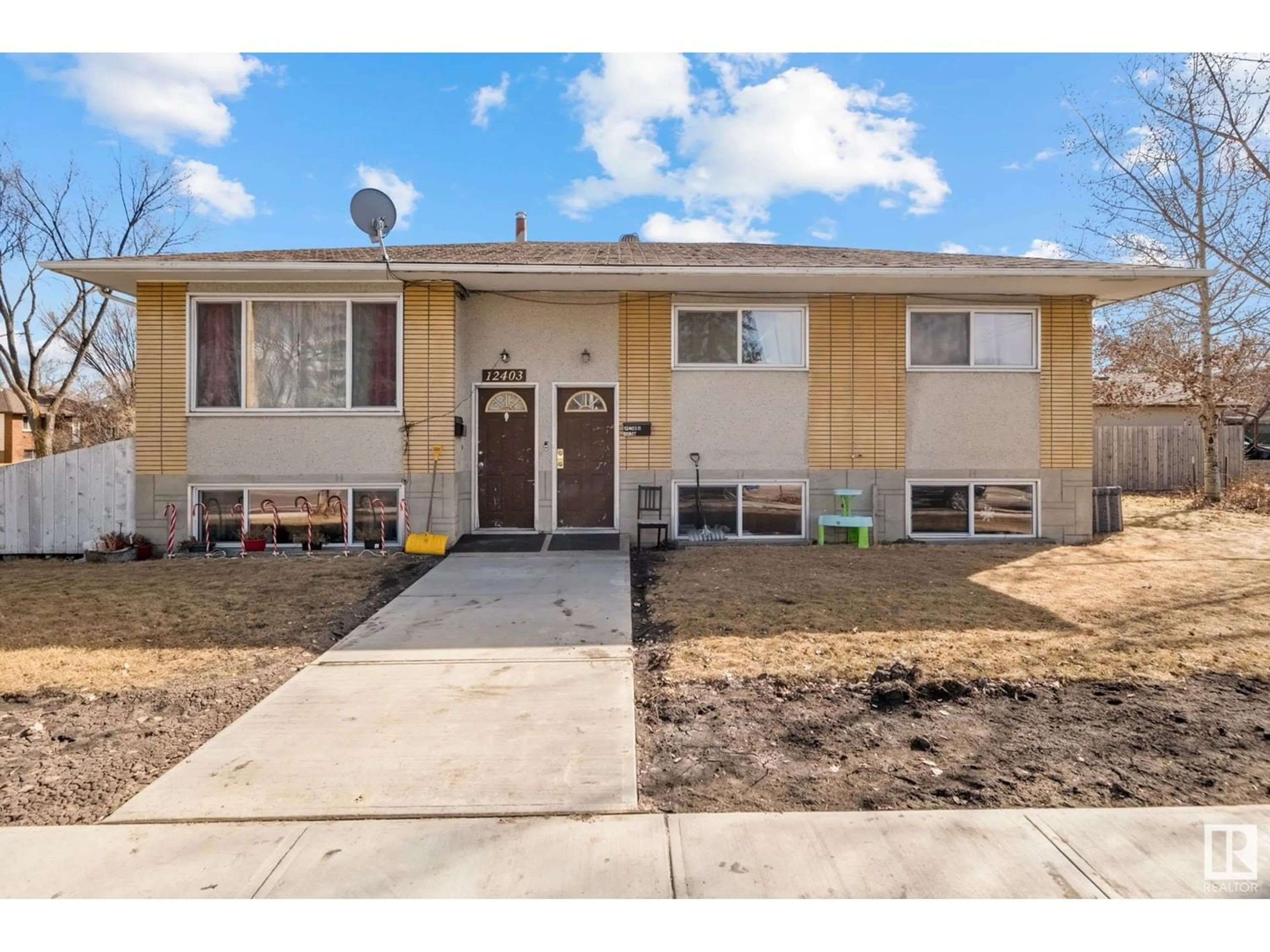 Frontside or backside of a home for 12403 130 AV NW, Edmonton Alberta T5L3K9