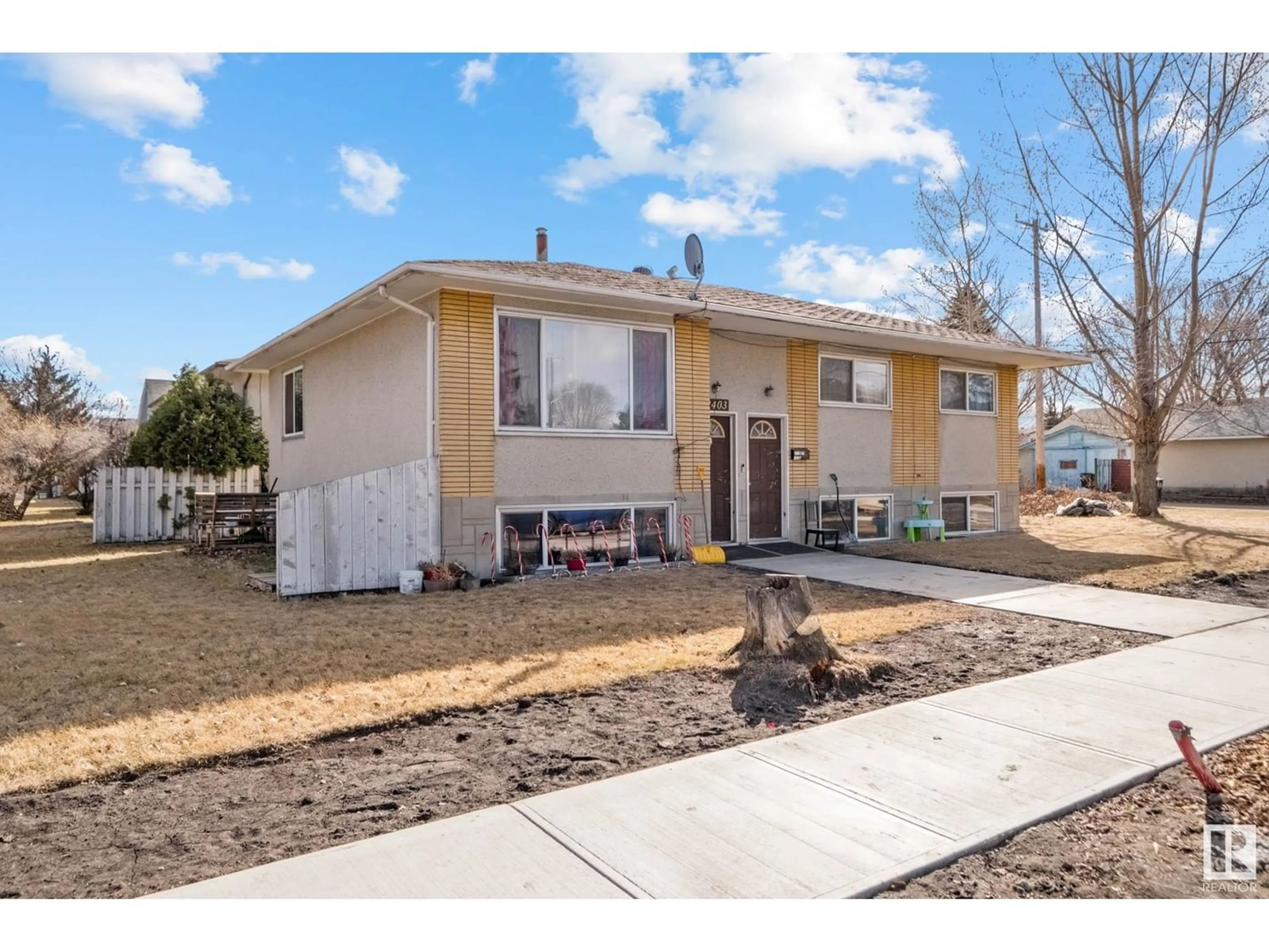 Frontside or backside of a home for 12403 130 AV NW, Edmonton Alberta T5L3K9