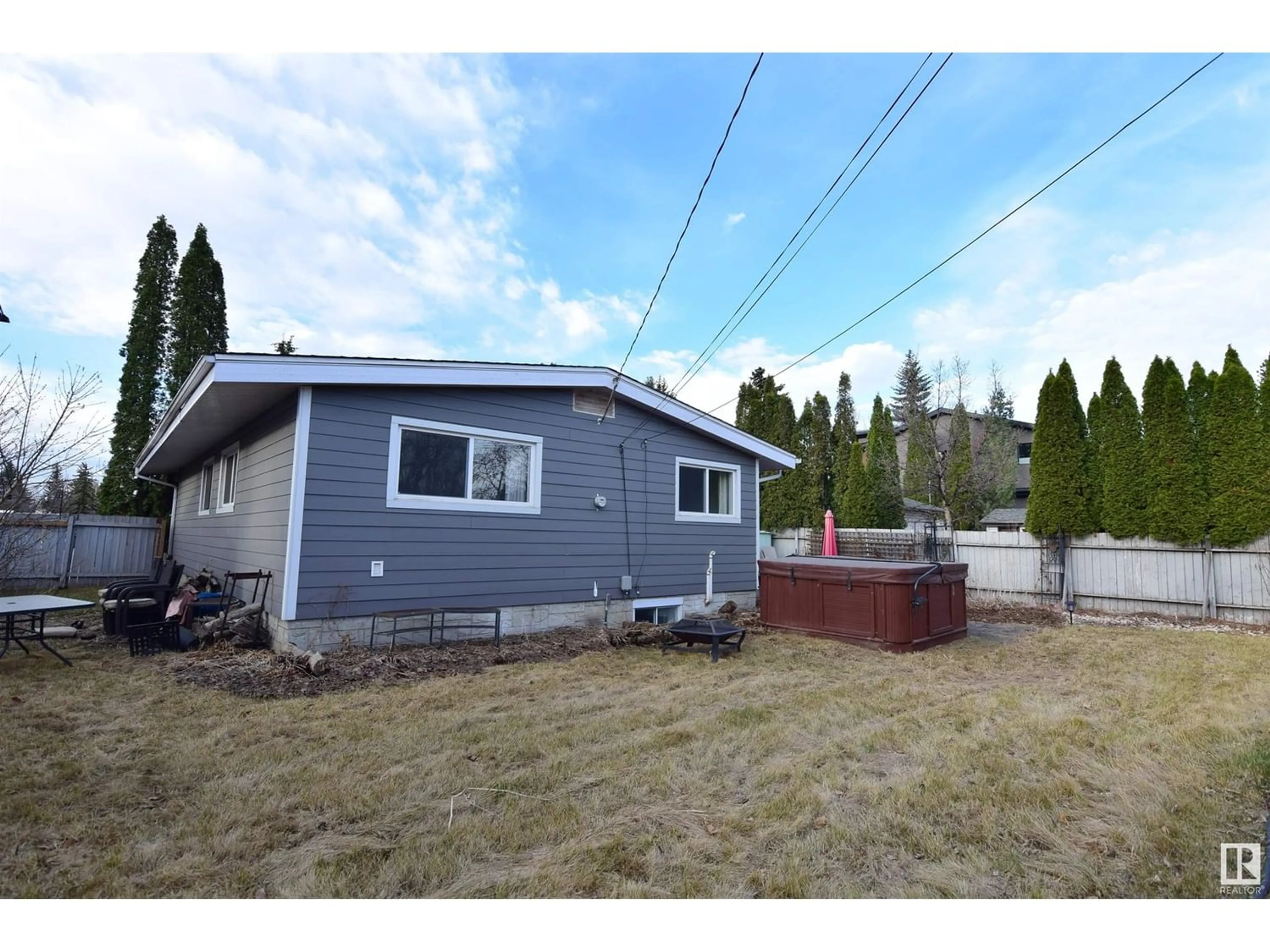 Frontside or backside of a home for 14704 80 AV NW, Edmonton Alberta T5R3K6