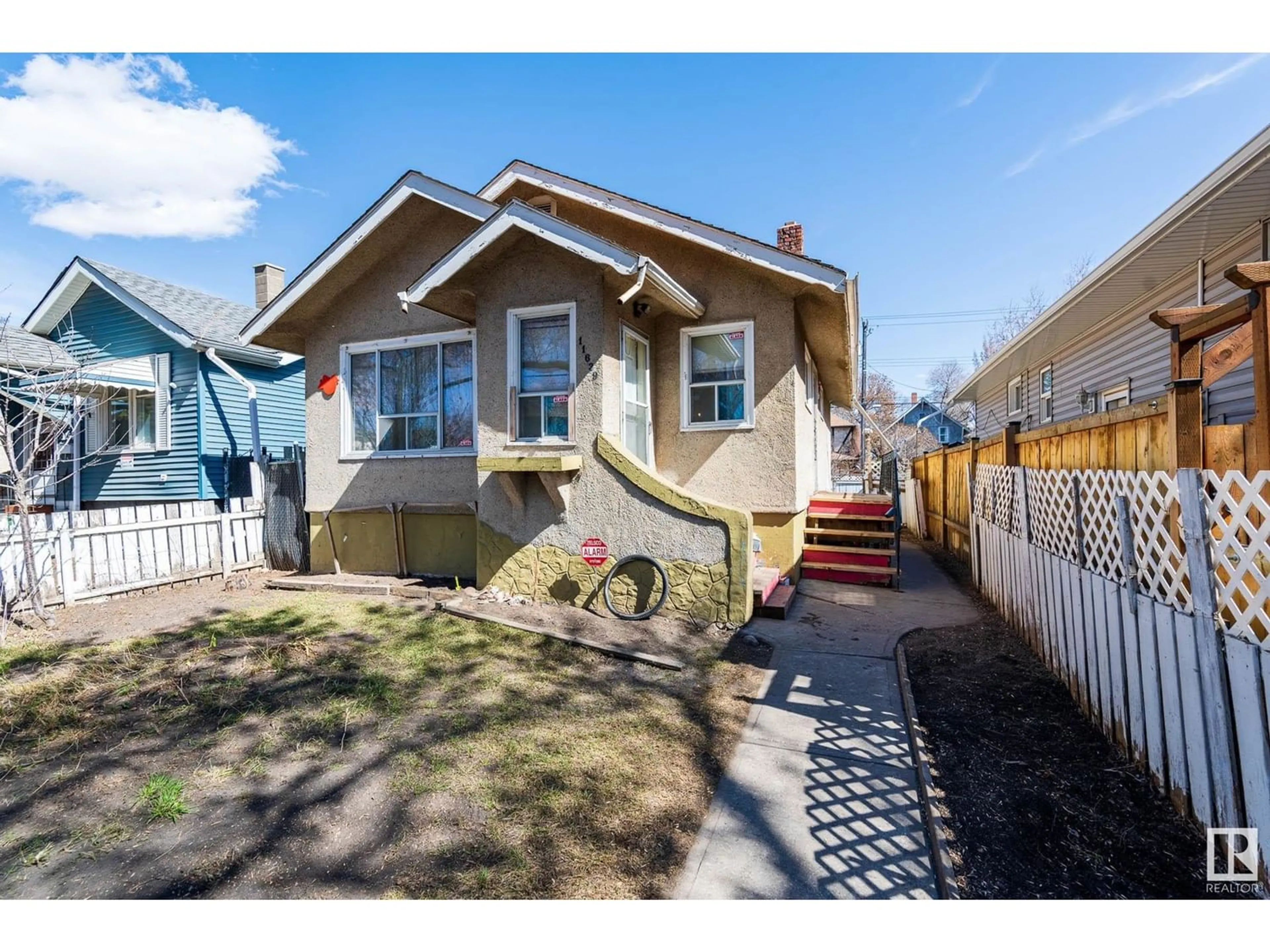 Frontside or backside of a home for 11639 97 ST NW, Edmonton Alberta T5G1Y1