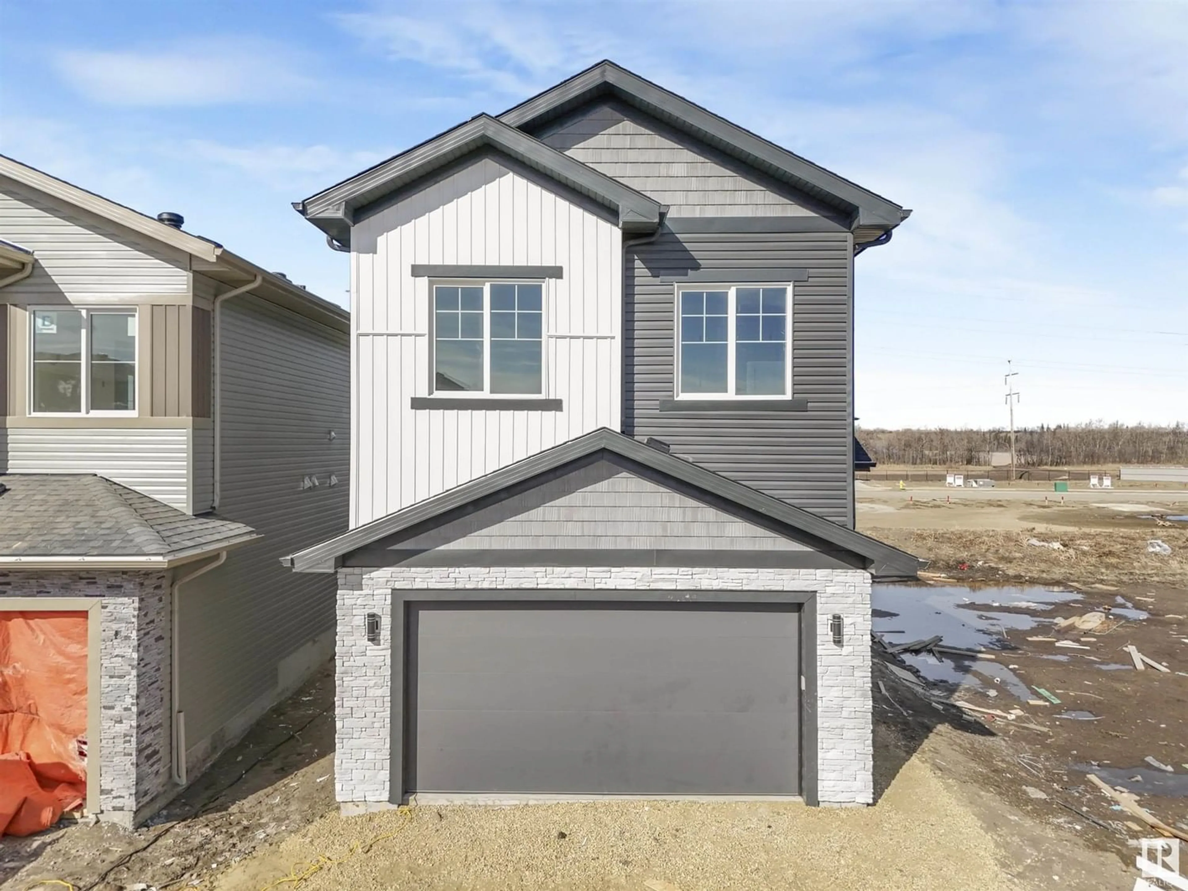 Frontside or backside of a home for 124 Wyatt RG, Fort Saskatchewan Alberta T8L0Y3