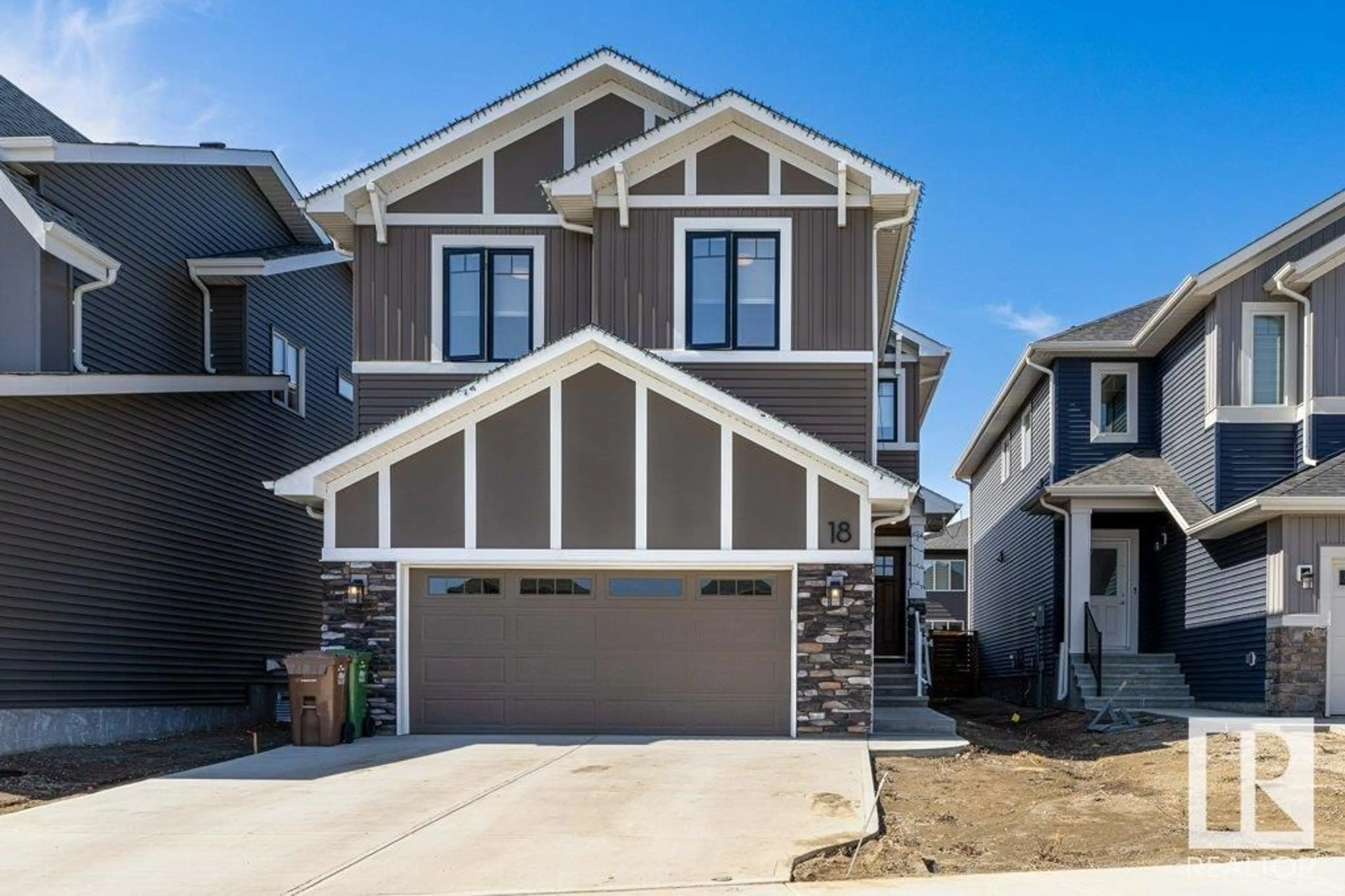 Frontside or backside of a home for 18 RED CREST WY, St. Albert Alberta T8N7Y7