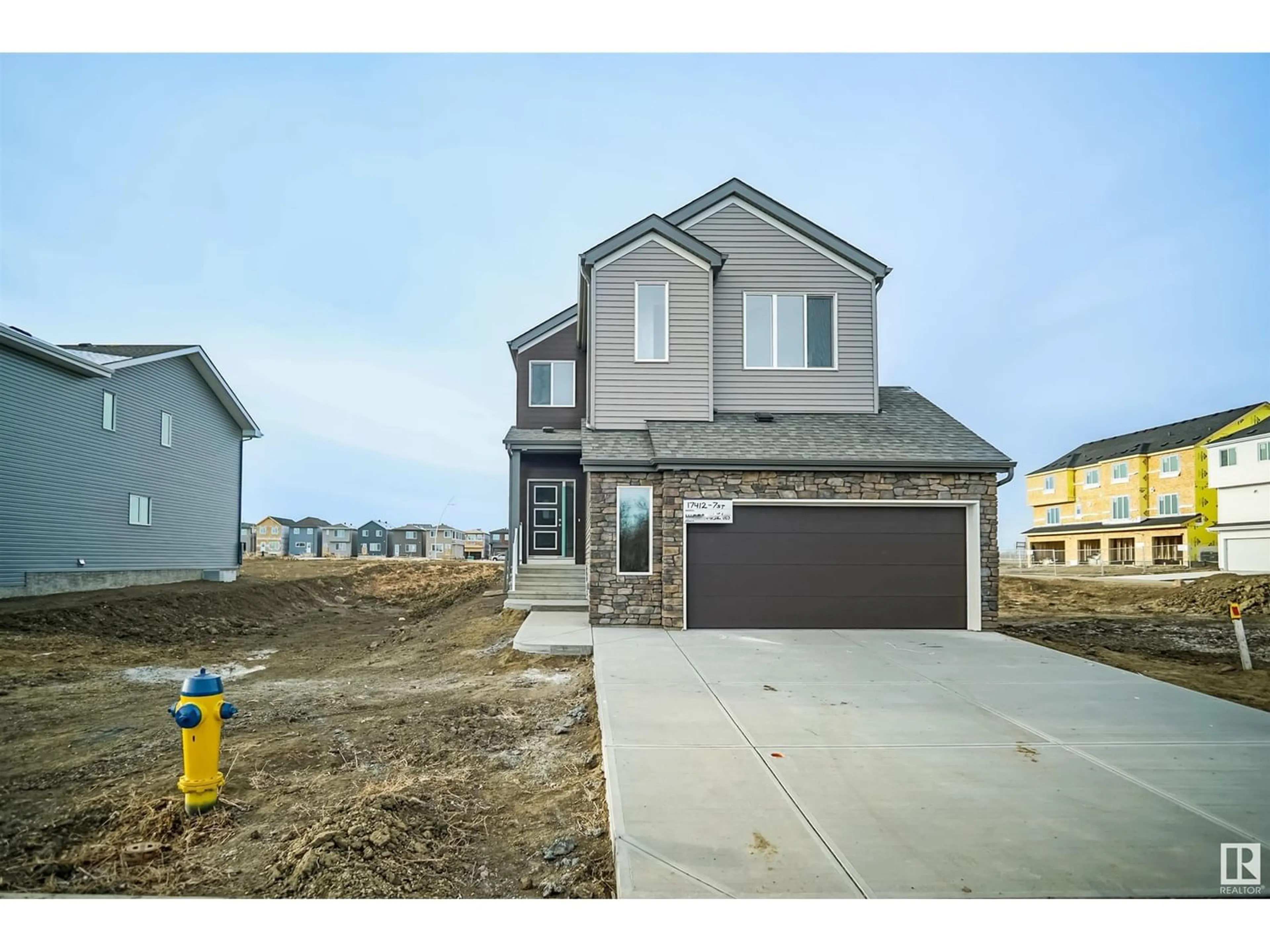 Frontside or backside of a home for 17412 7 ST NE, Edmonton Alberta T5Y3K7