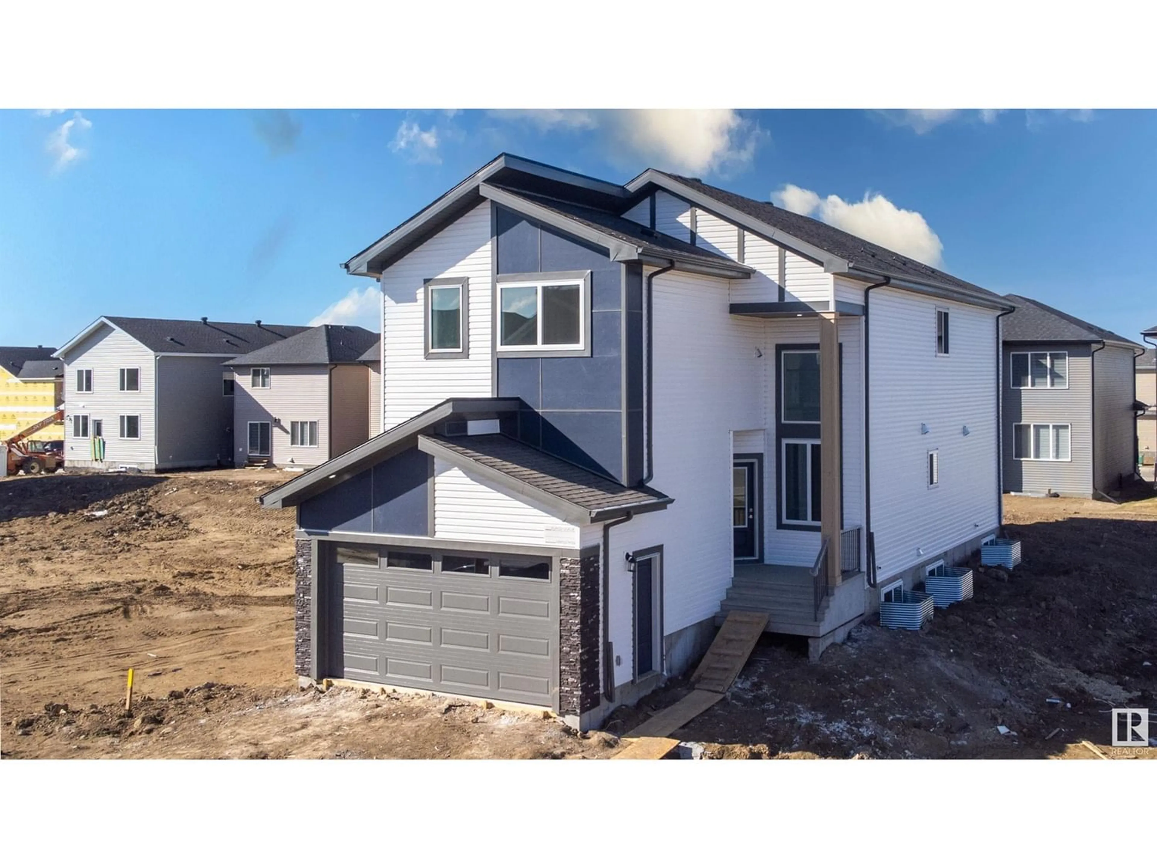 Frontside or backside of a home for 1540 11 AV NW, Edmonton Alberta T6T0G9