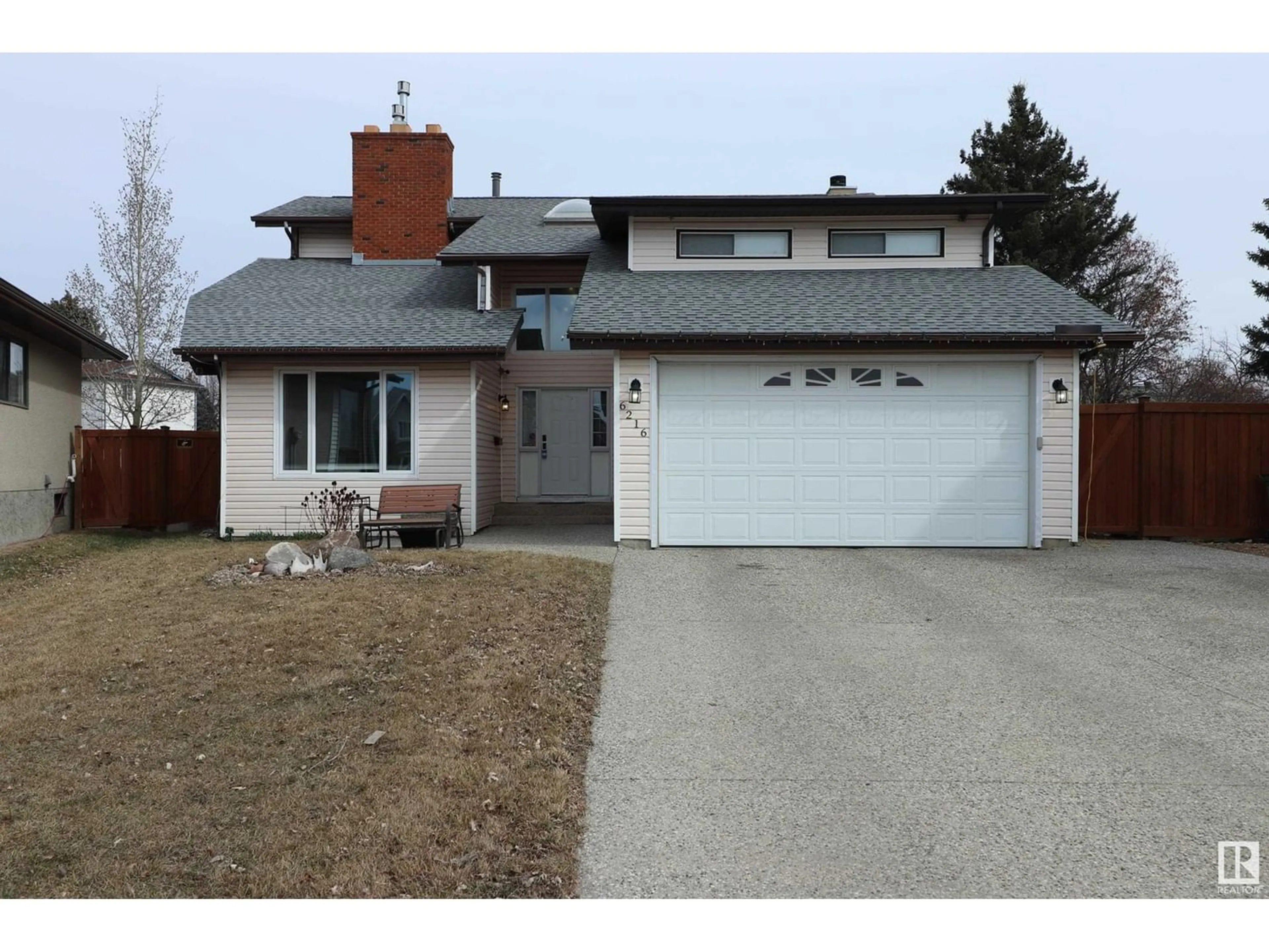 Frontside or backside of a home for 6216 11 AV NW, Edmonton Alberta T6L2G4