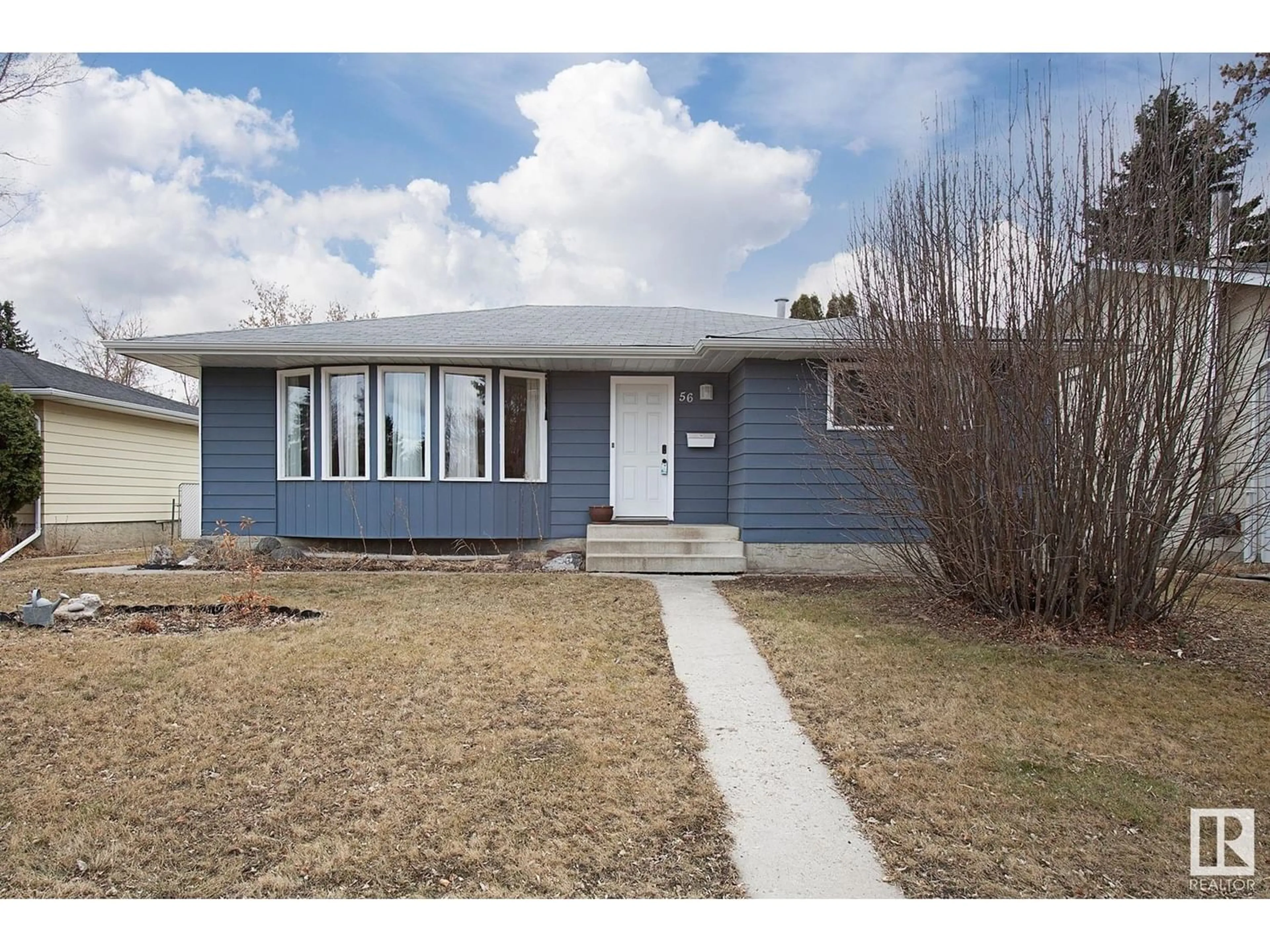 Frontside or backside of a home for 56 WOODHAVEN DR, Spruce Grove Alberta T7X1M8