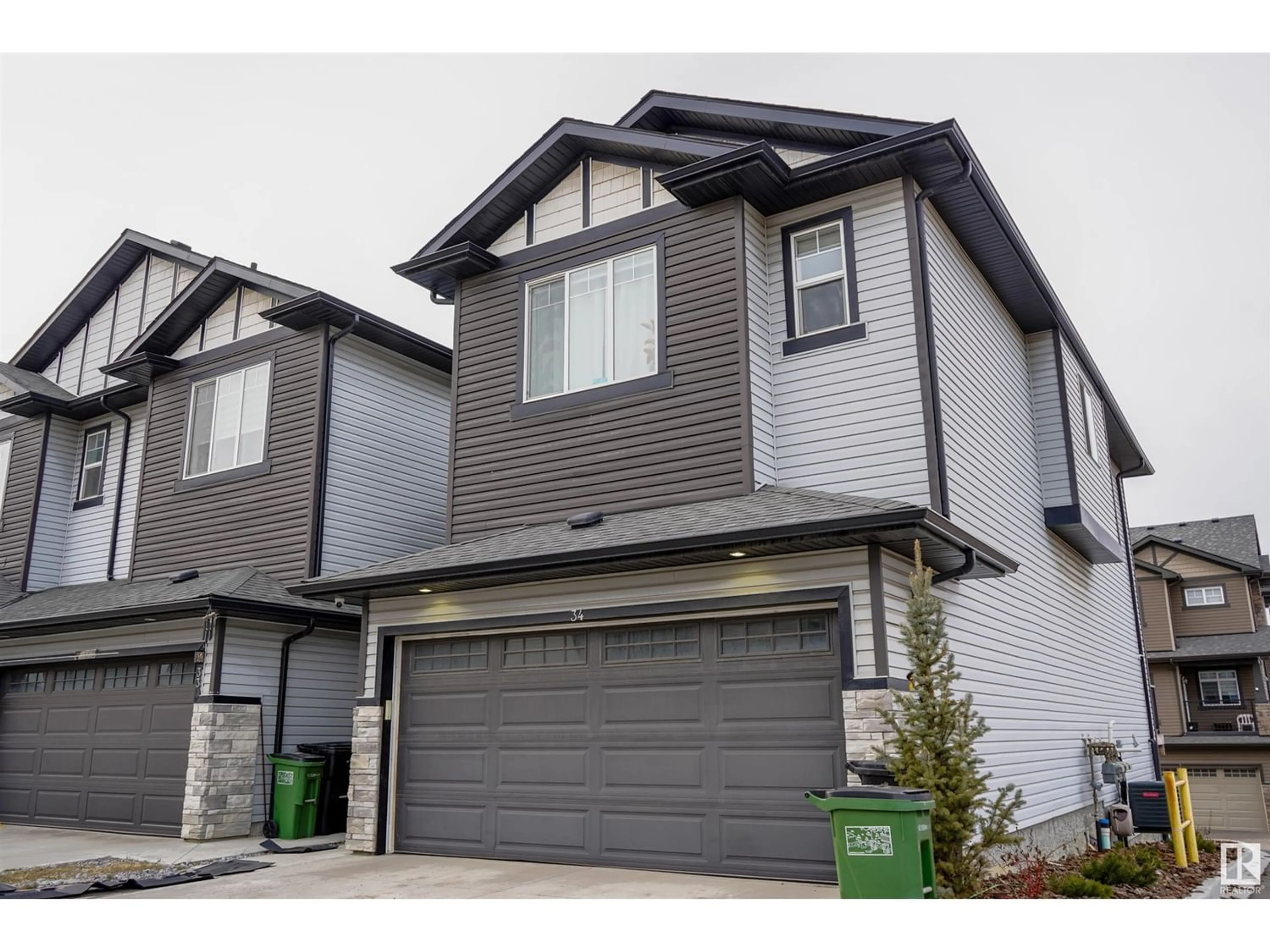 Frontside or backside of a home for #34 1703 16 AV NW, Edmonton Alberta T6T2C3