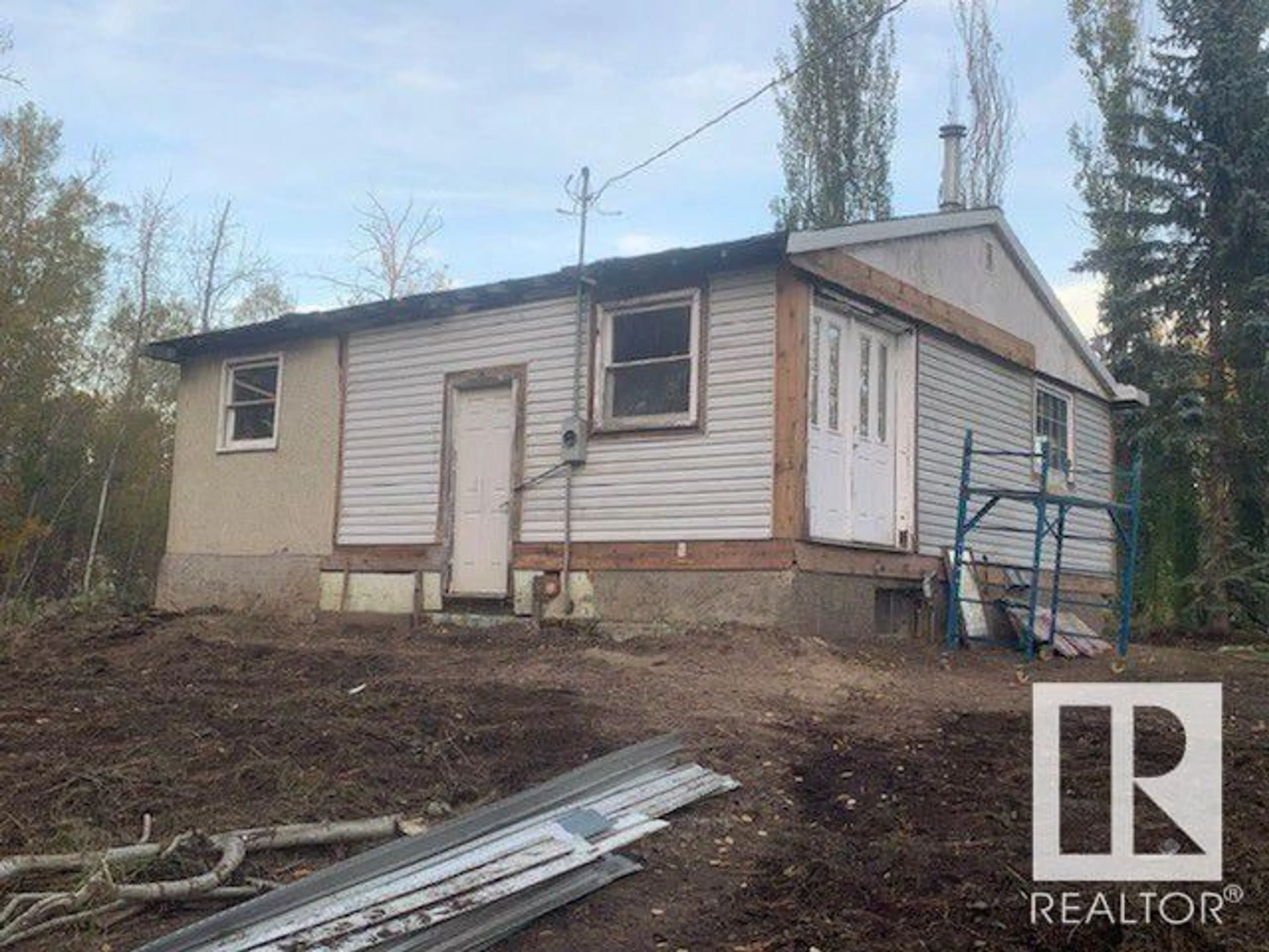 Frontside or backside of a home for #106 54425 STE. ANNE TR, Rural Lac Ste. Anne County Alberta T0E0A0