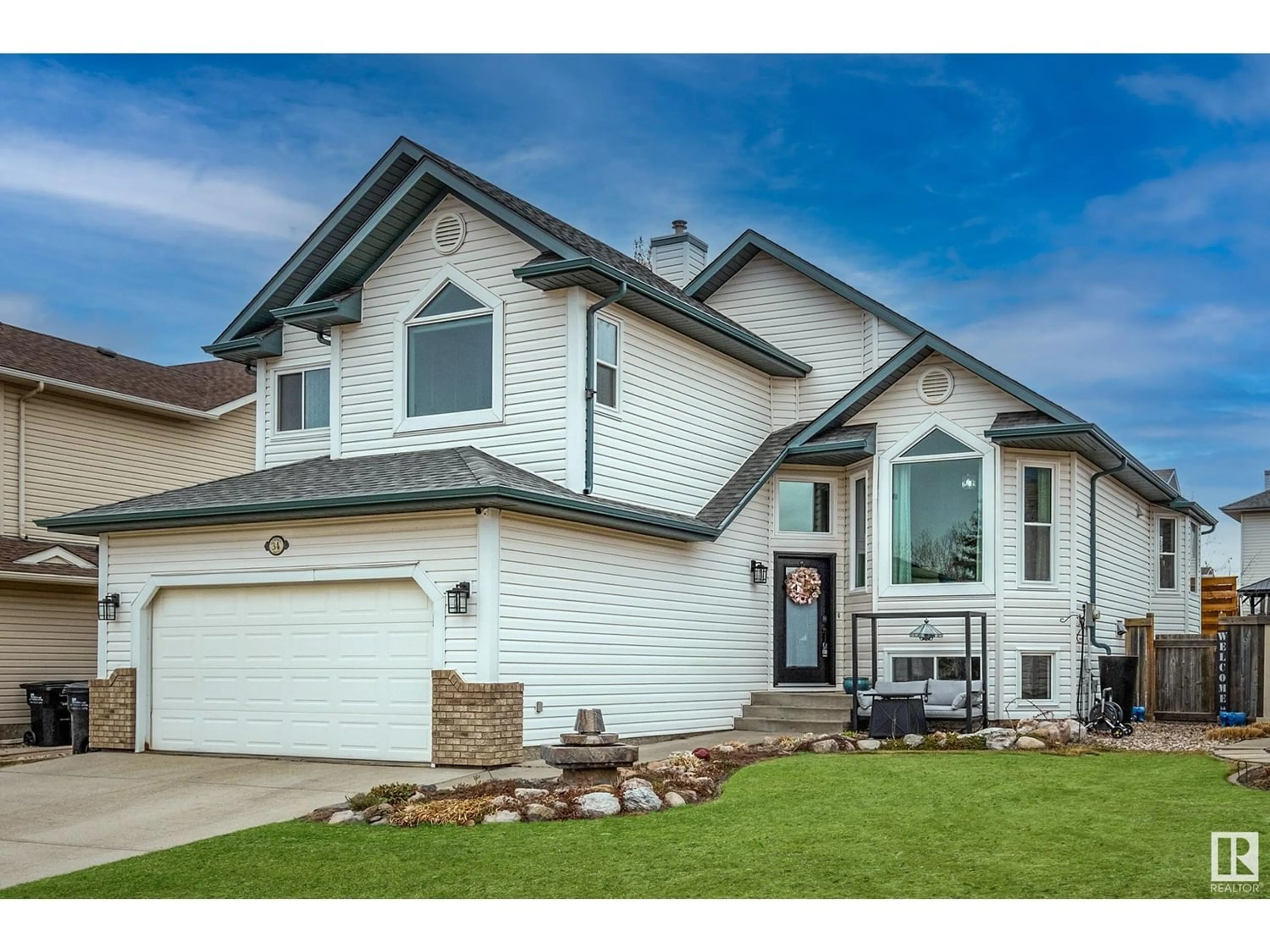 Frontside or backside of a home for 34 CLARKDALE DR, Sherwood Park Alberta T8H2E2