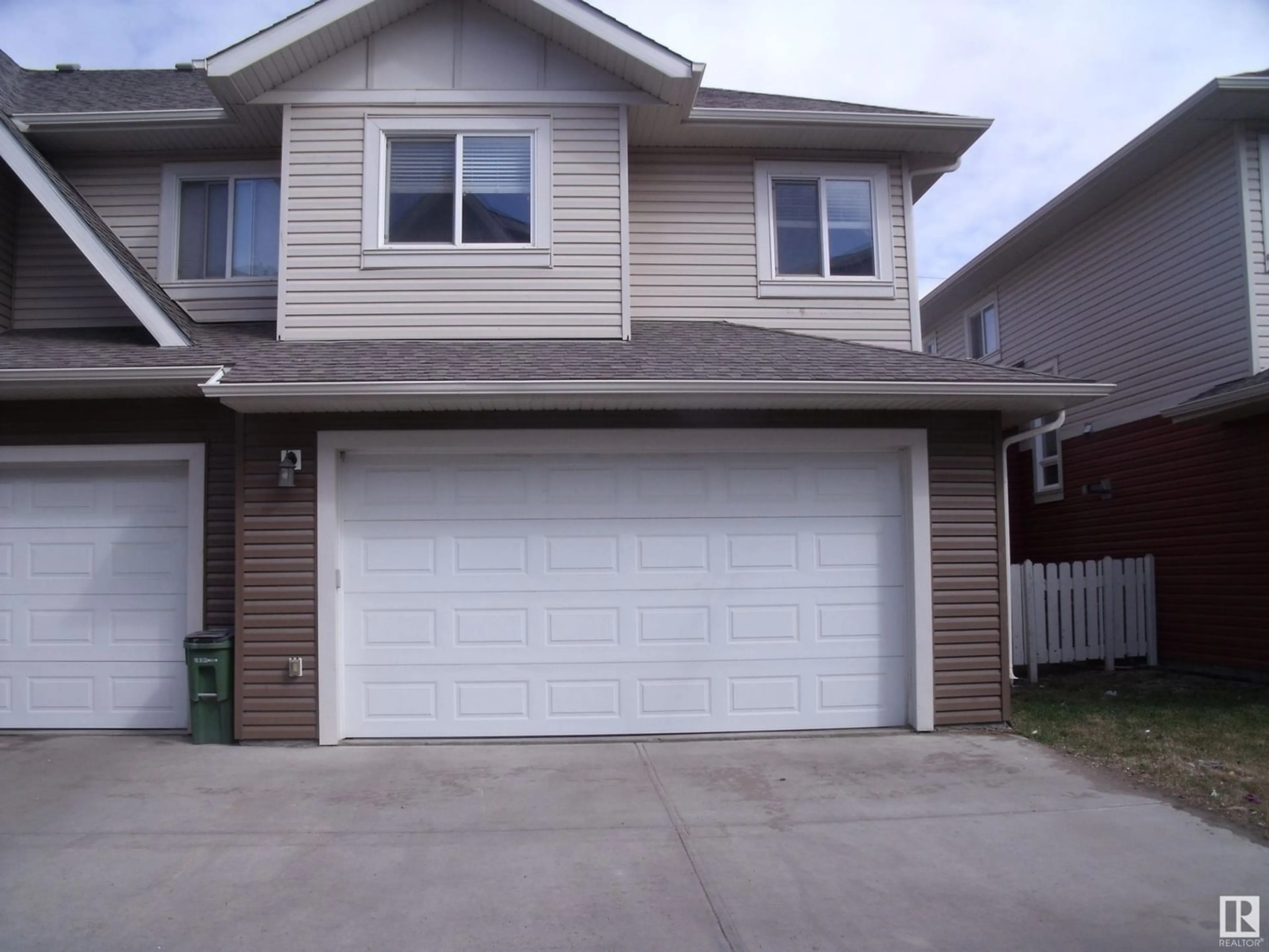 Frontside or backside of a home for 13031 132 AV NW, Edmonton Alberta T5L3R2