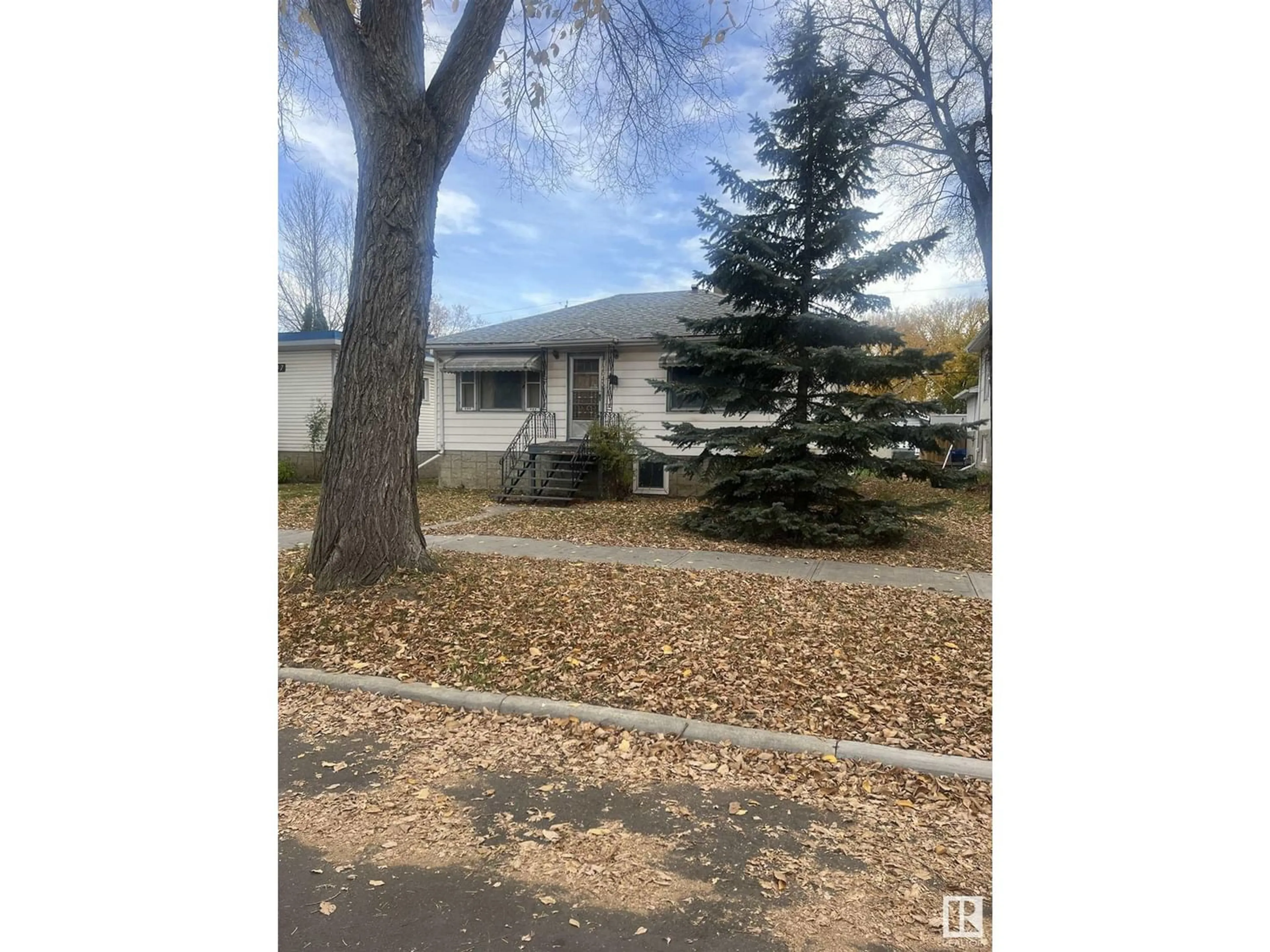Frontside or backside of a home for 12043 63 ST NW, Edmonton Alberta T5W4G5