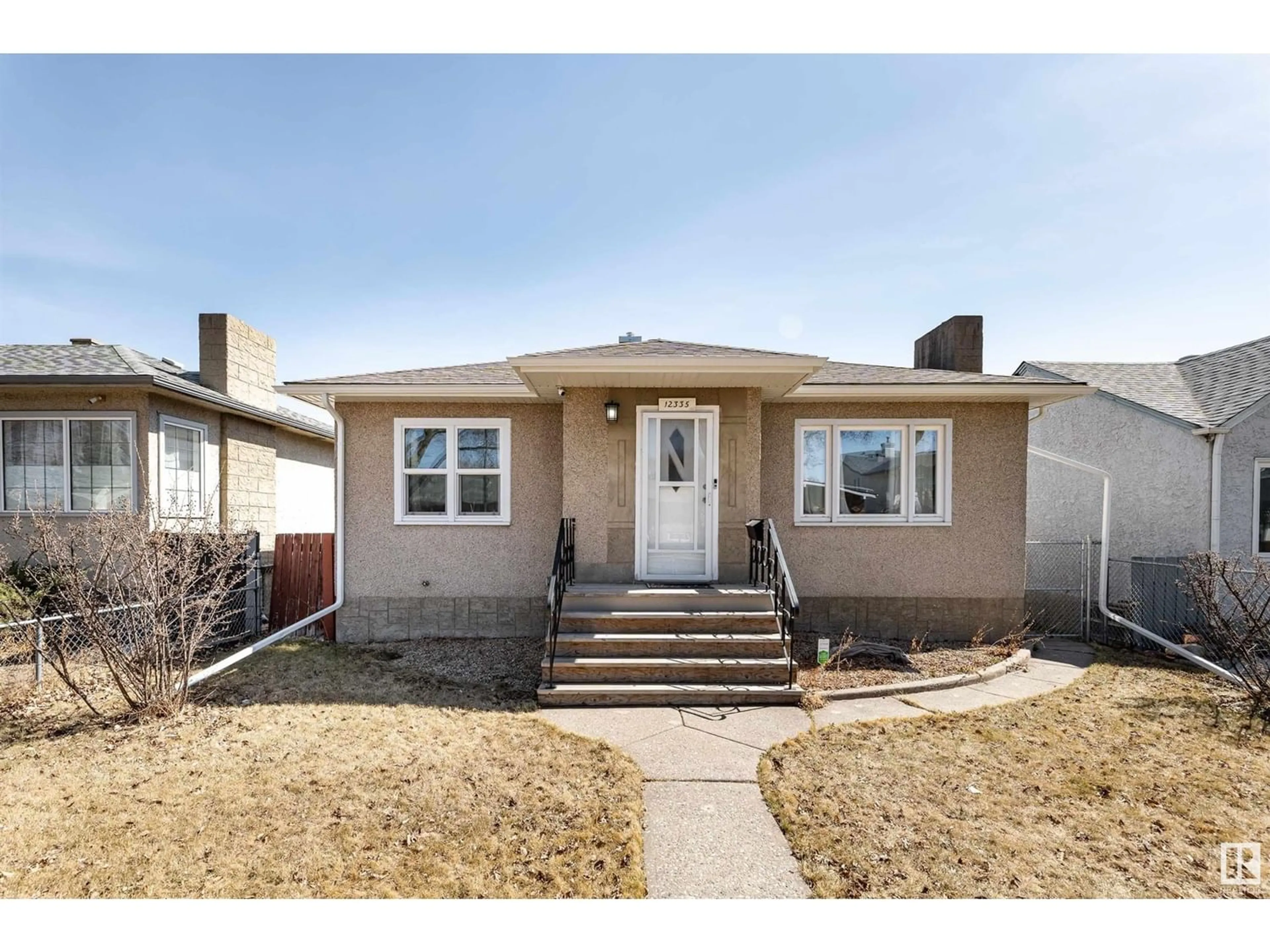 Frontside or backside of a home for 12335 93 ST NW, Edmonton Alberta T5G1G3