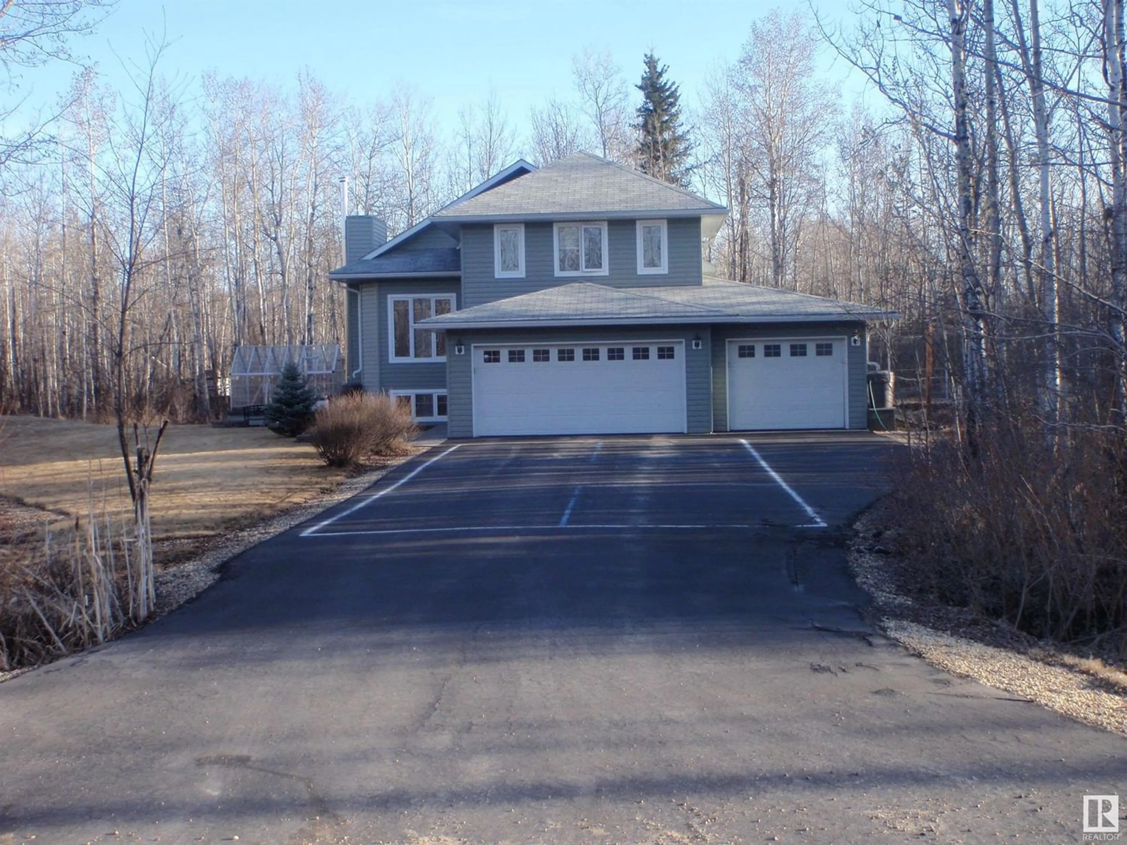 Frontside or backside of a home for 702 57304 Range Rd 25, Rural Barrhead County Alberta T7N1N4