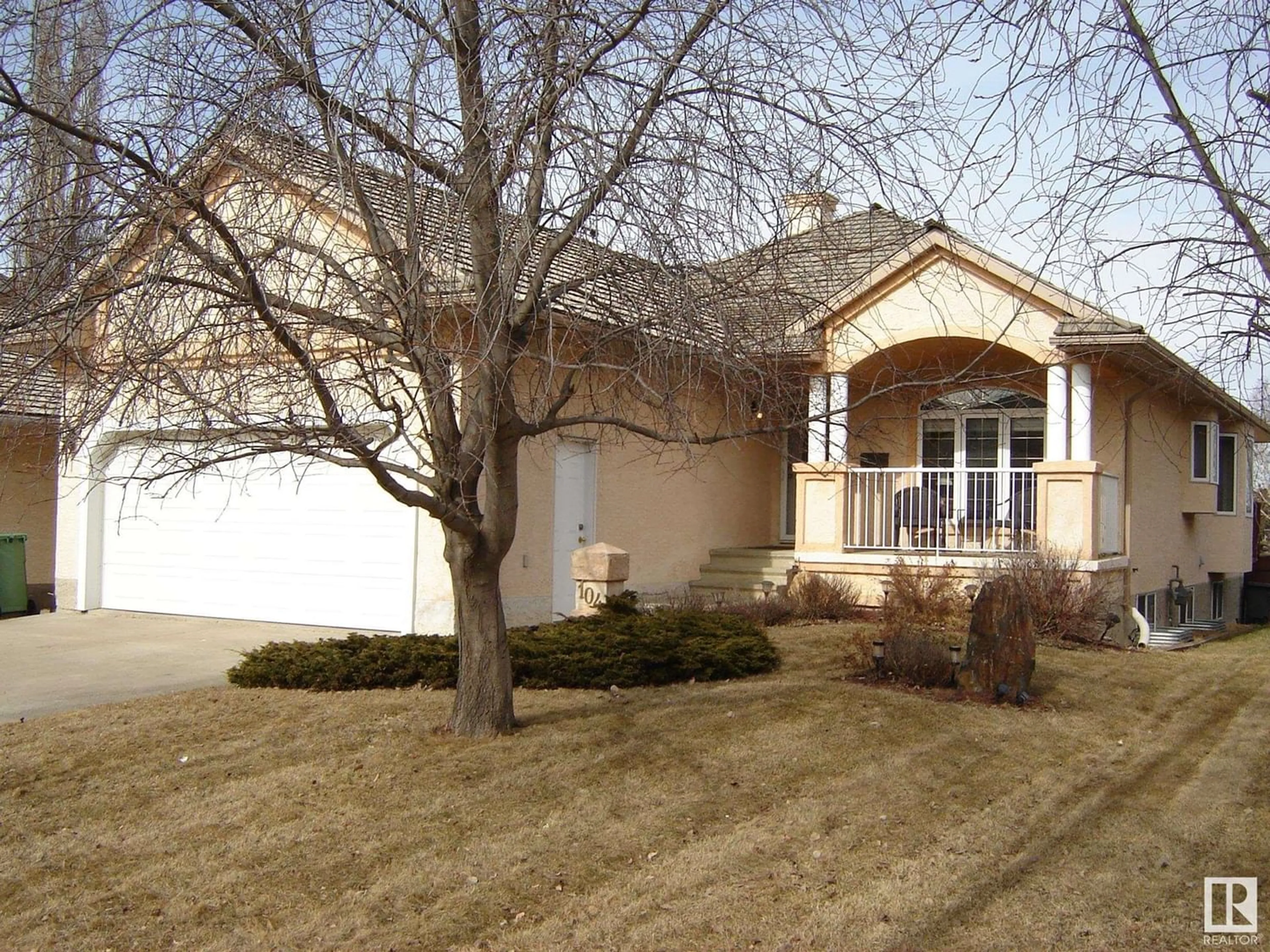 Frontside or backside of a home for 104 COLONIALE WY, Beaumont Alberta T4X1N2