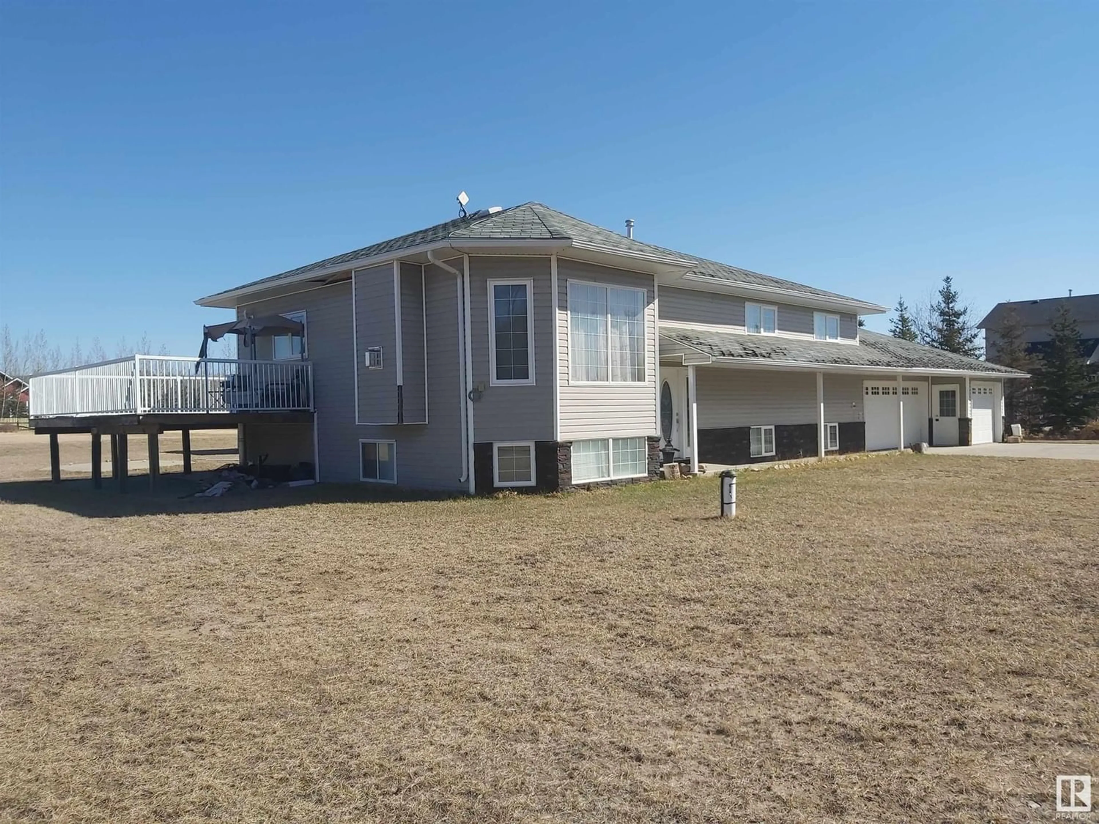 Frontside or backside of a home, the front or back of building for #24 53522 Range Road 272, Rural Parkland County Alberta T7X3N2