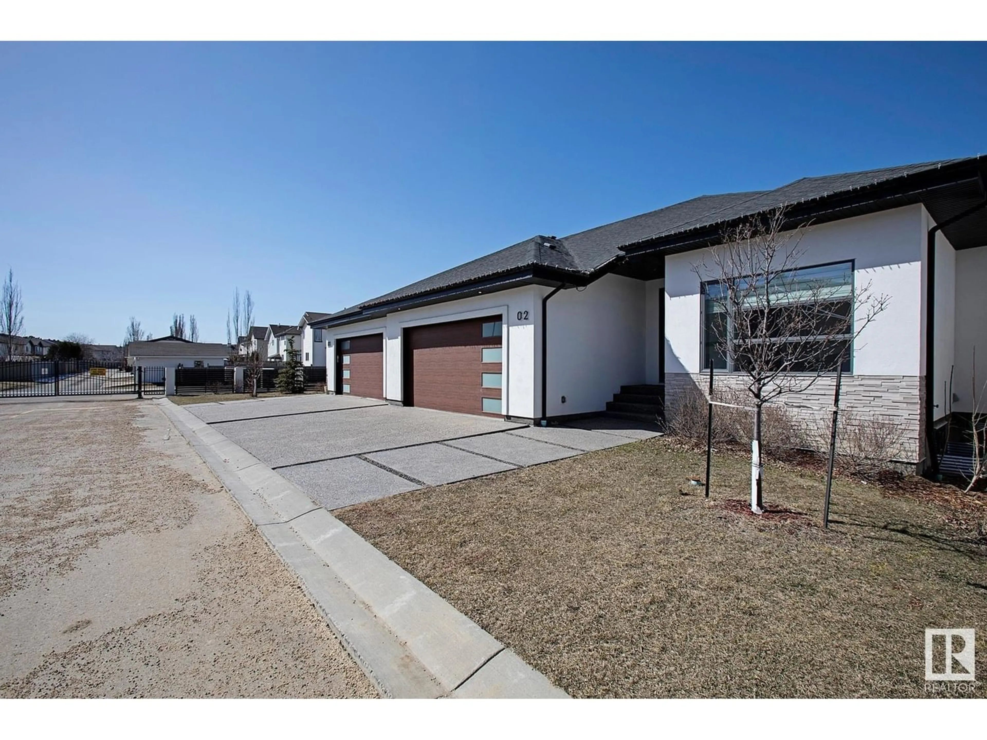 Frontside or backside of a home for #2 604 MCALLISTER LO SW, Edmonton Alberta T6W1N1