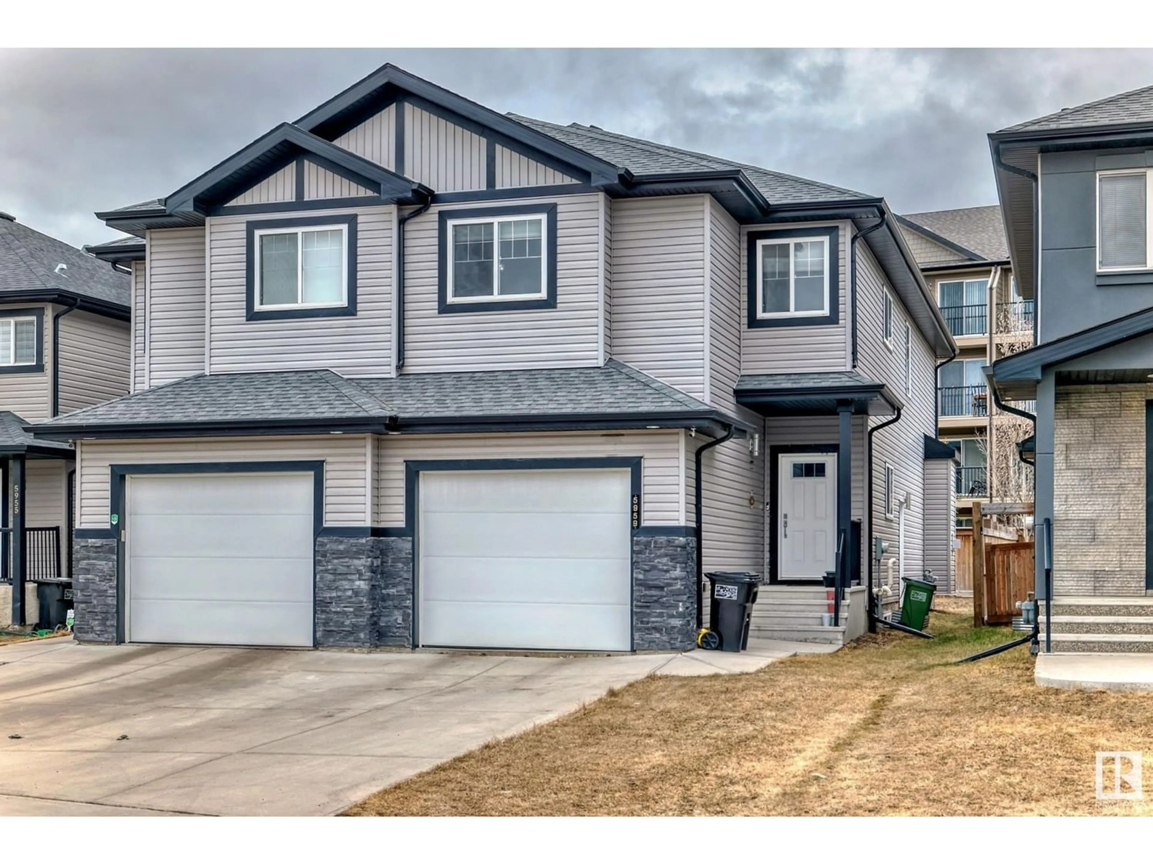 Frontside or backside of a home for 5959 167C AV NW, Edmonton Alberta T5Y0W5