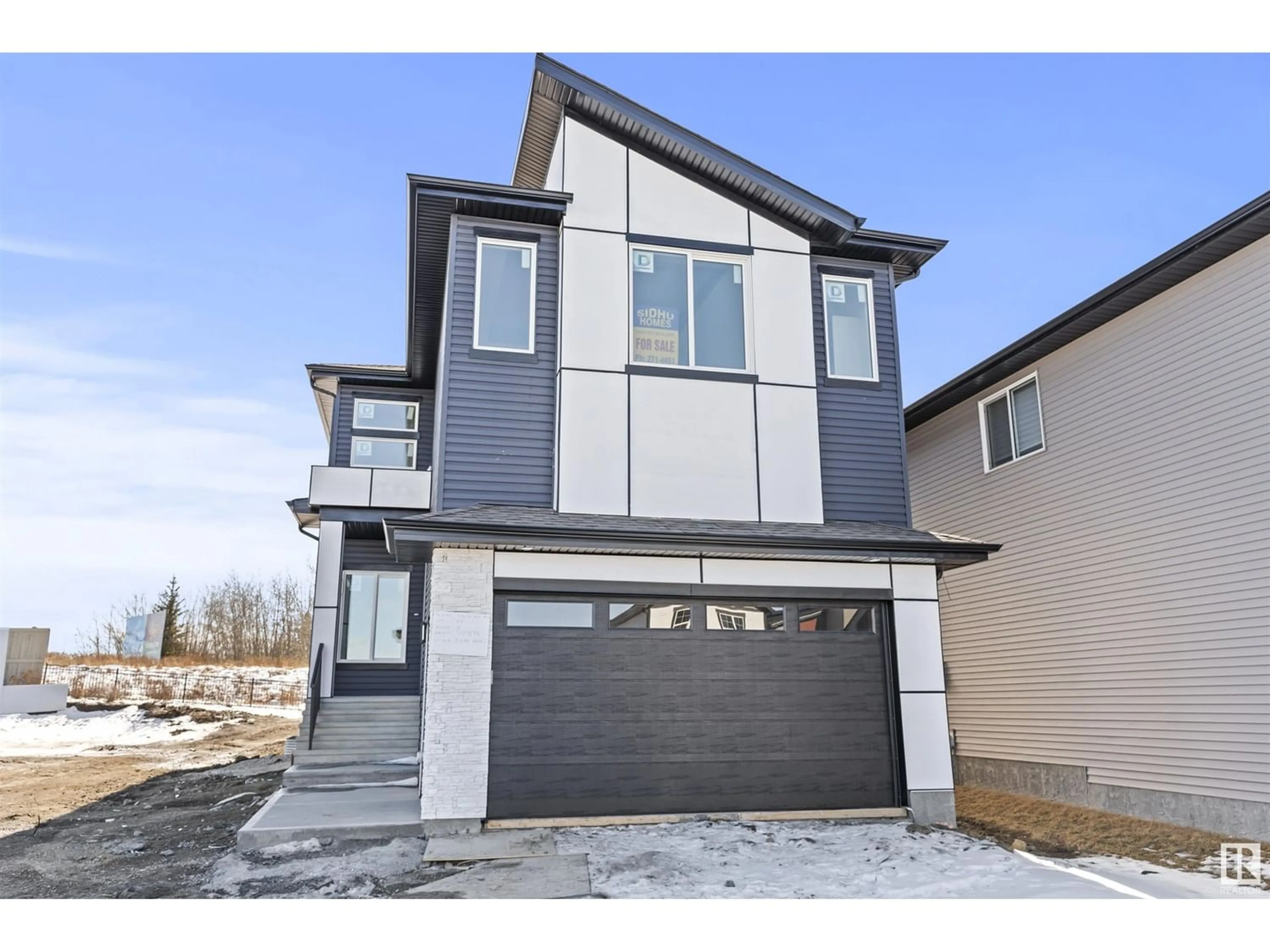 Frontside or backside of a home for 311 35 AV NW, Edmonton Alberta T6T2P8