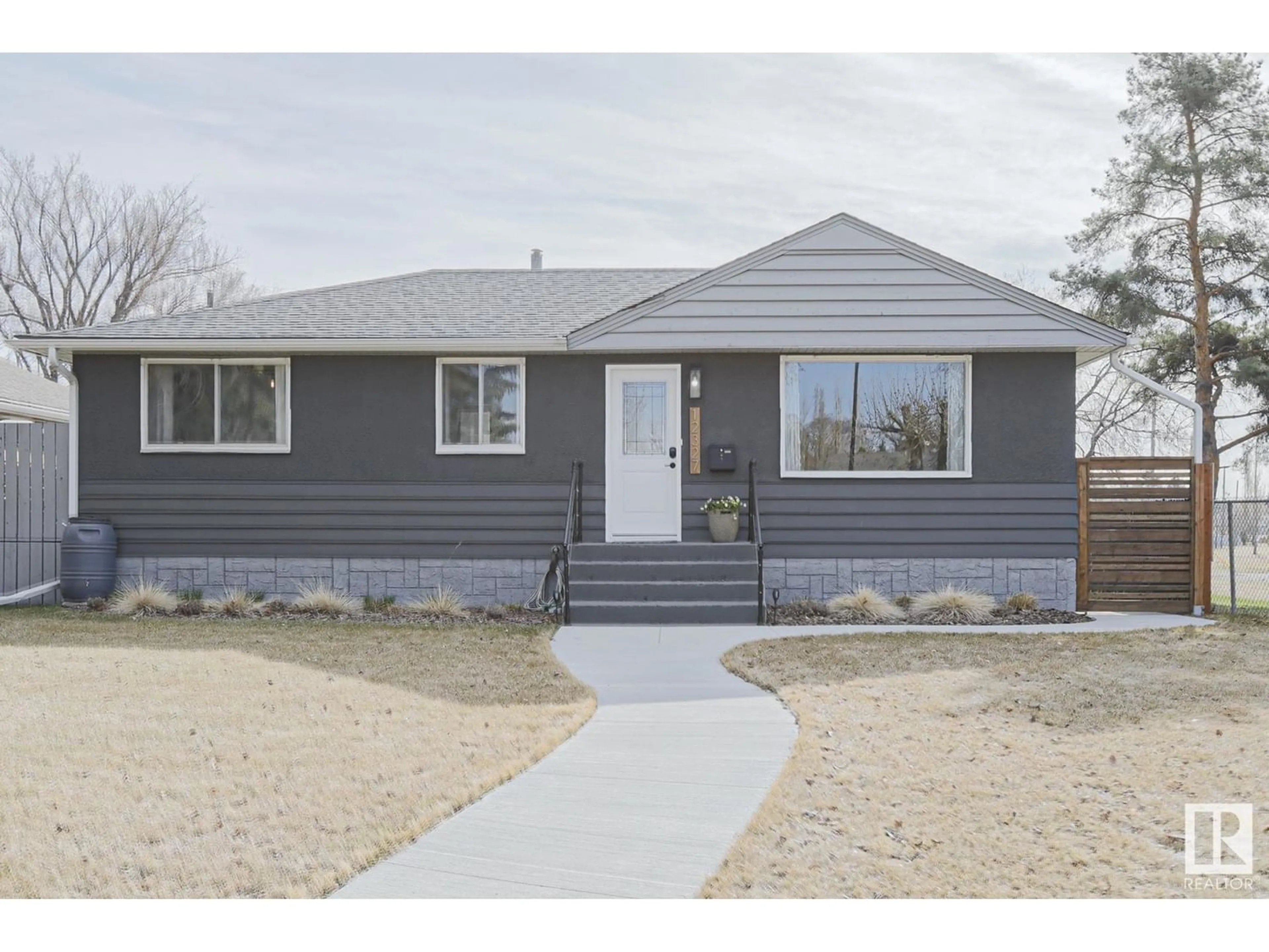 Home with vinyl exterior material for 12327 140 ST NW, Edmonton Alberta T5L2C9