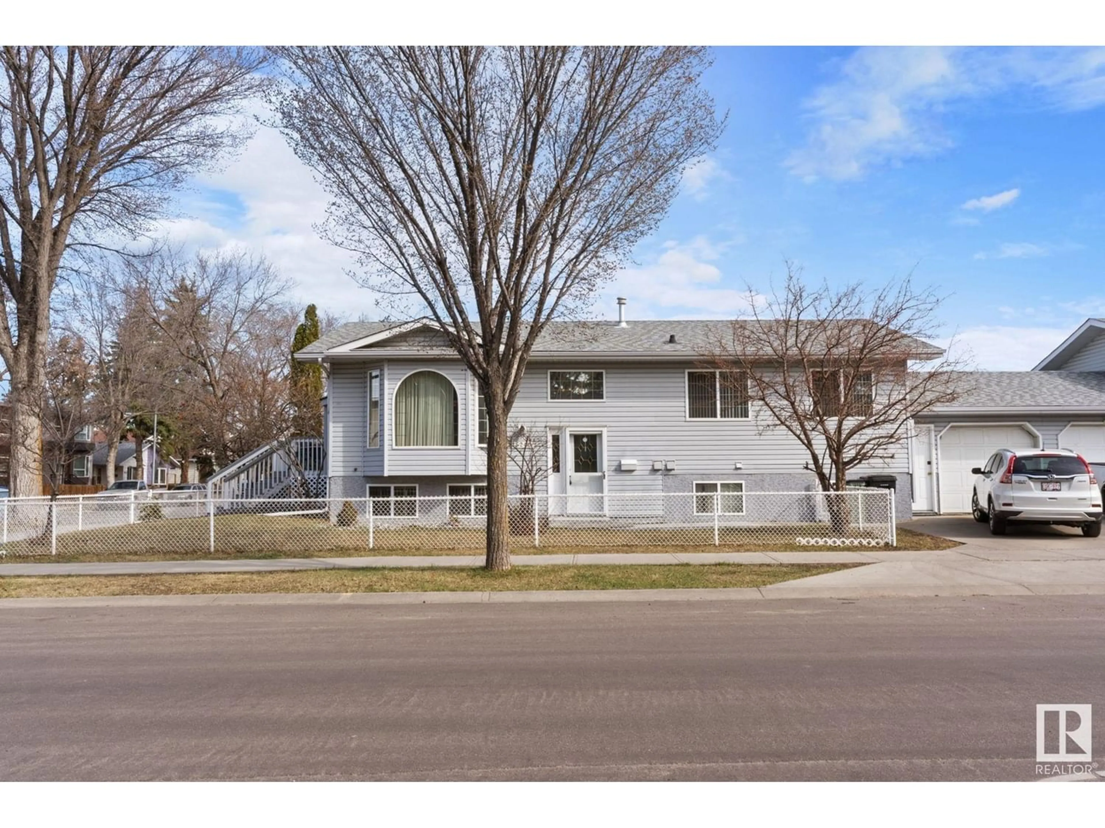Frontside or backside of a home for 15240 104 AV NW, Edmonton Alberta T5P0R6