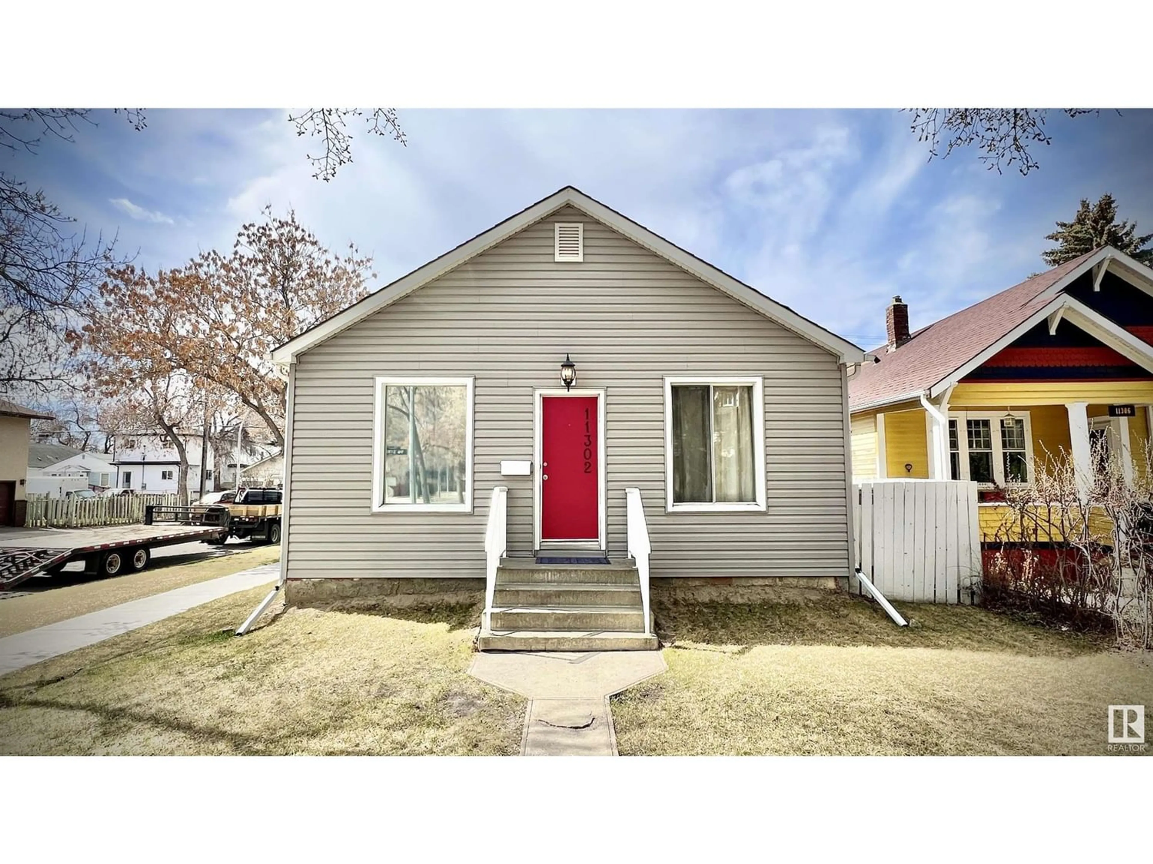 Frontside or backside of a home for 11302 96 ST NW, Edmonton Alberta T5G1T3