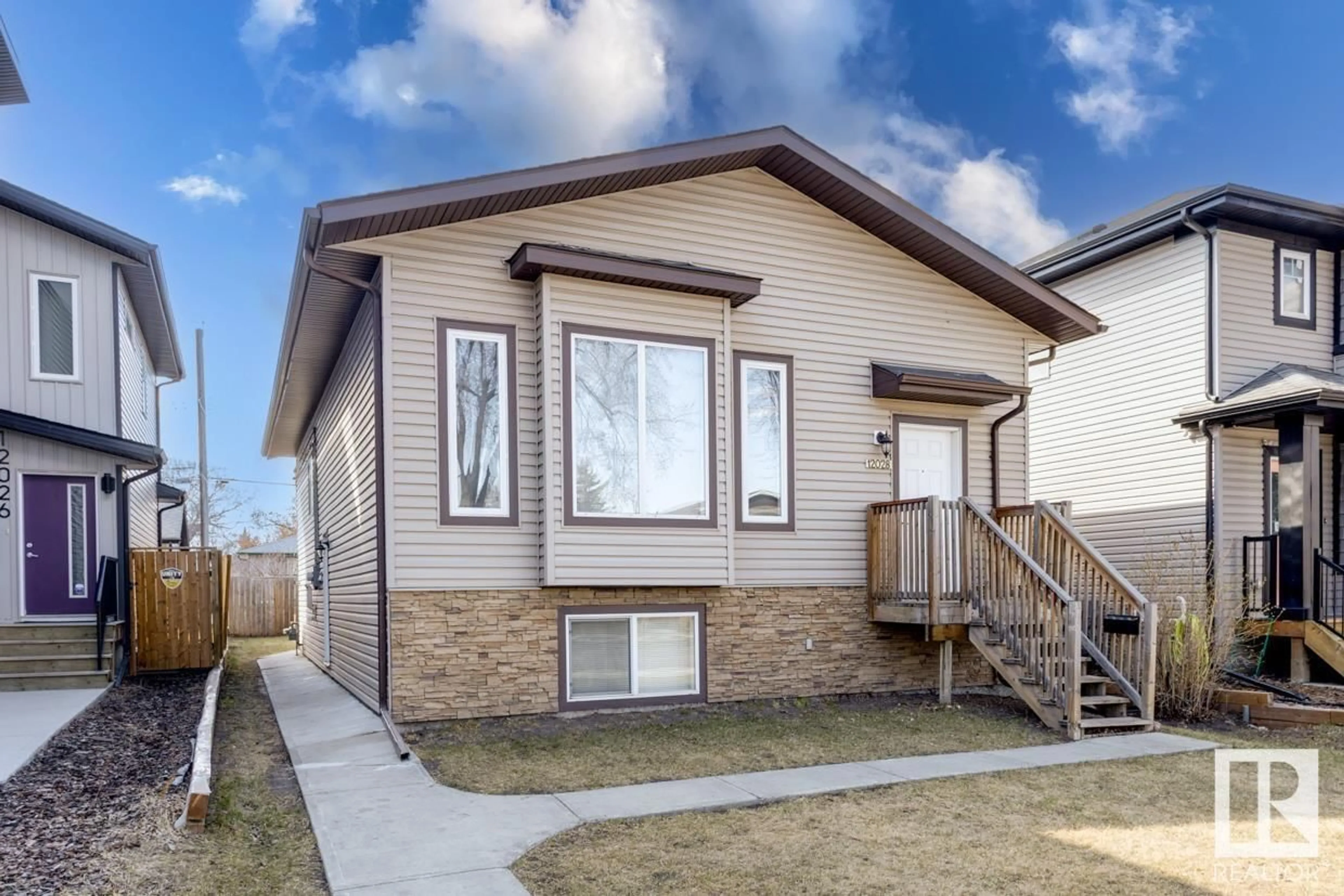Frontside or backside of a home for 12028 95 ST NW NW, Edmonton Alberta T5G1M7