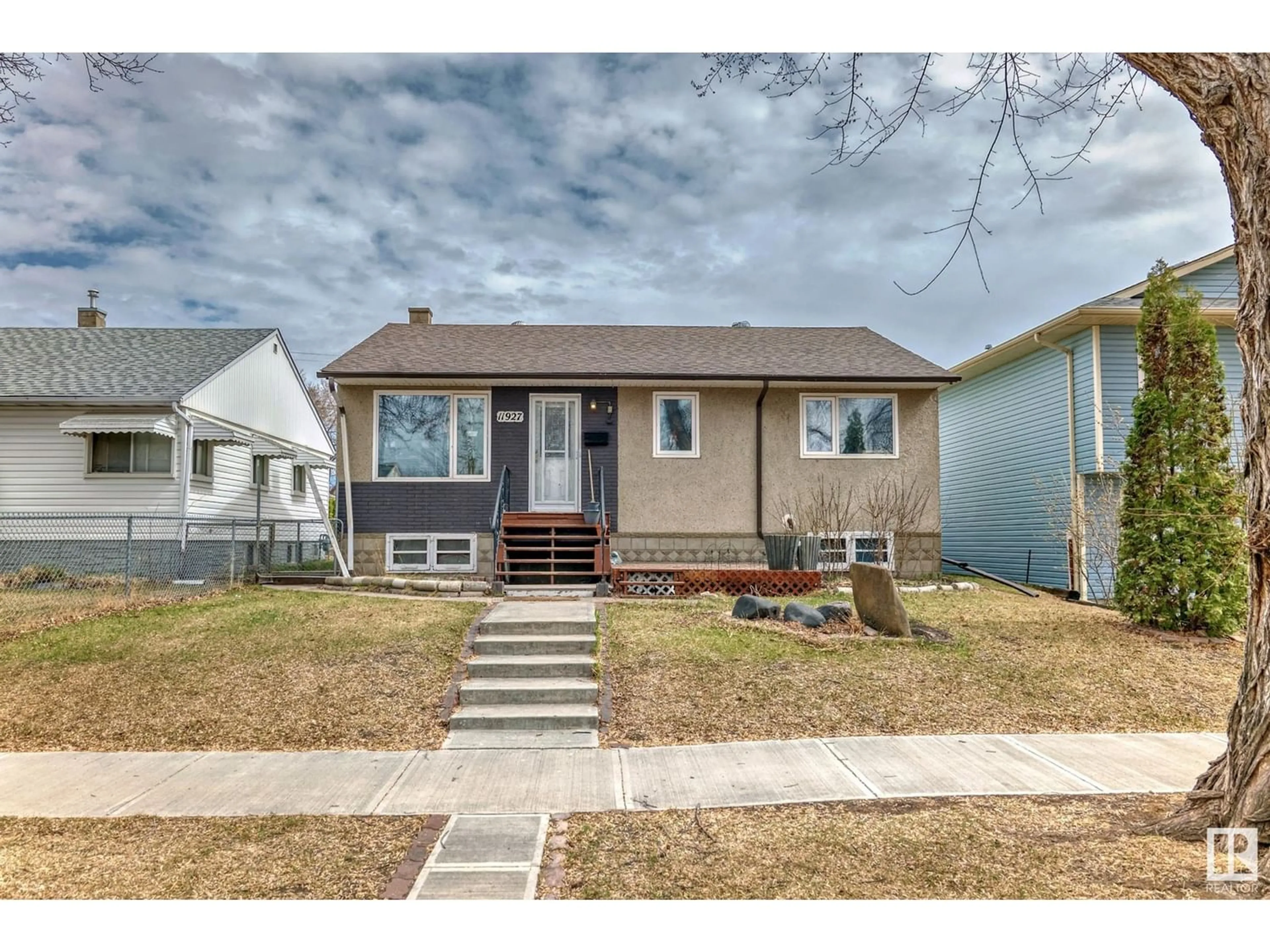Frontside or backside of a home for 11927 53 ST NW, Edmonton Alberta T5W3L4