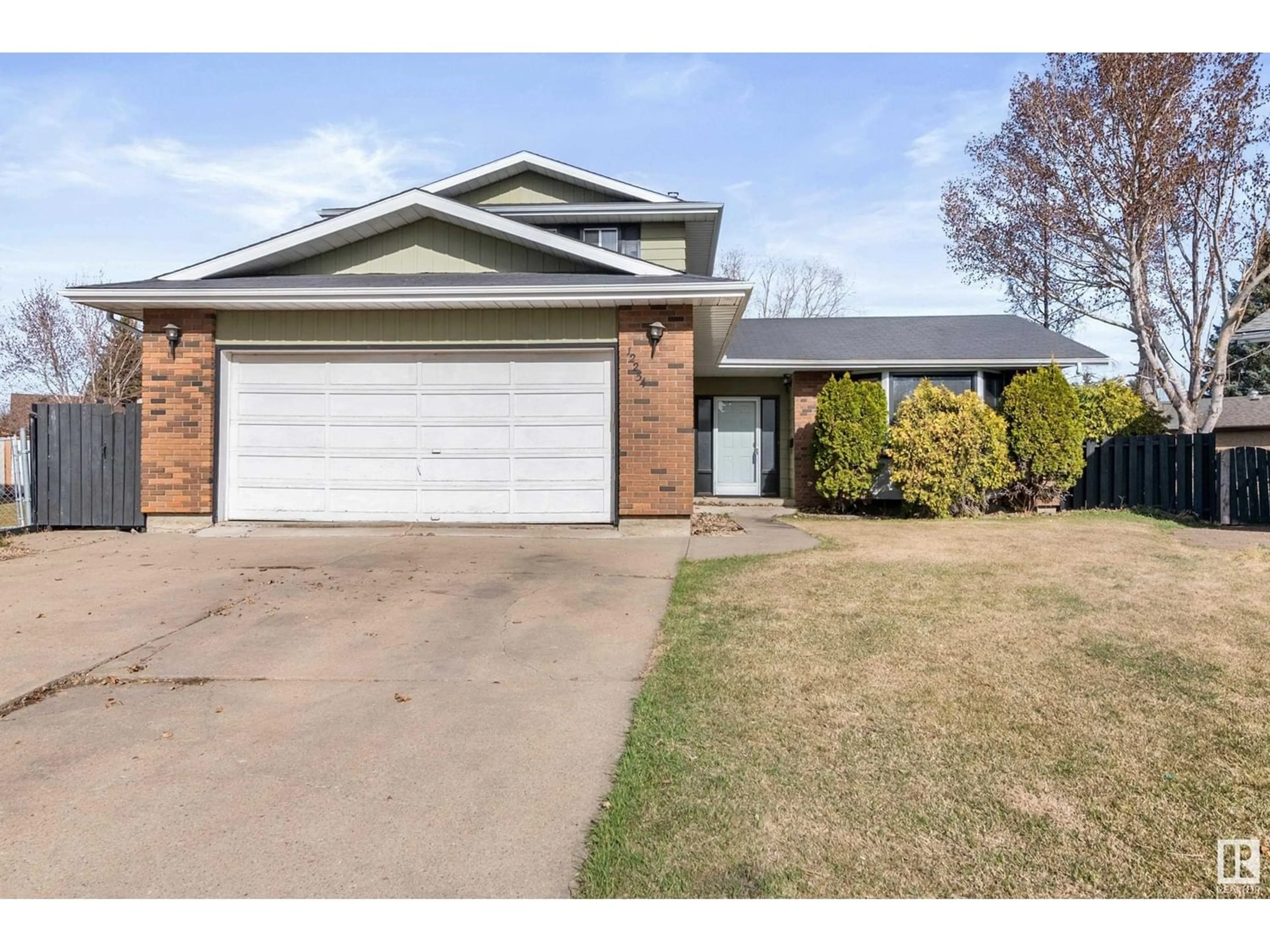 Frontside or backside of a home for 12254 143 AV NW, Edmonton Alberta T5X3R7