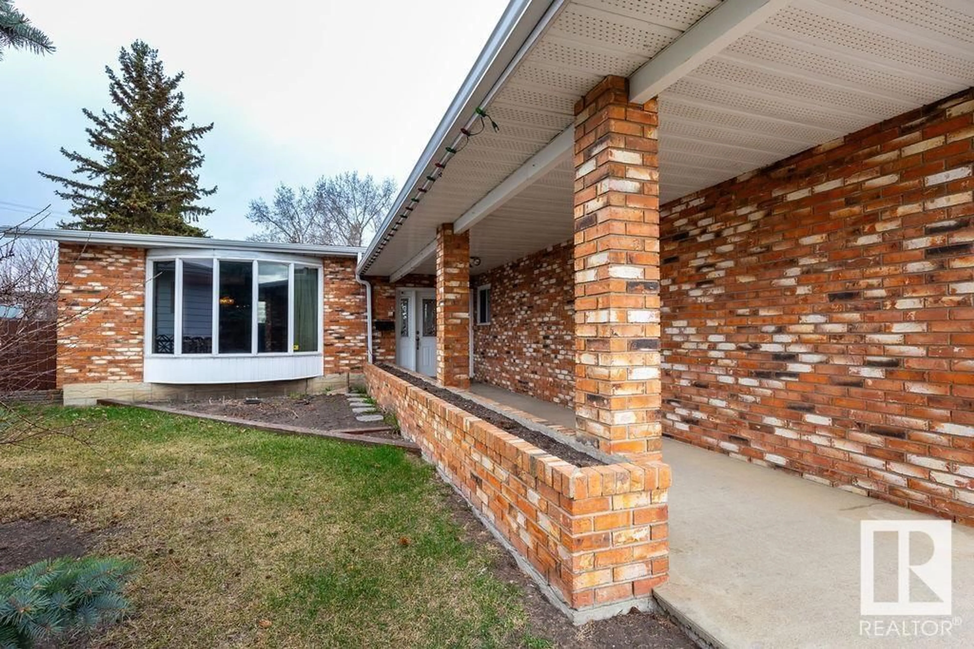 Home with brick exterior material for 9560 143 AV NW, Edmonton Alberta T5E2H3
