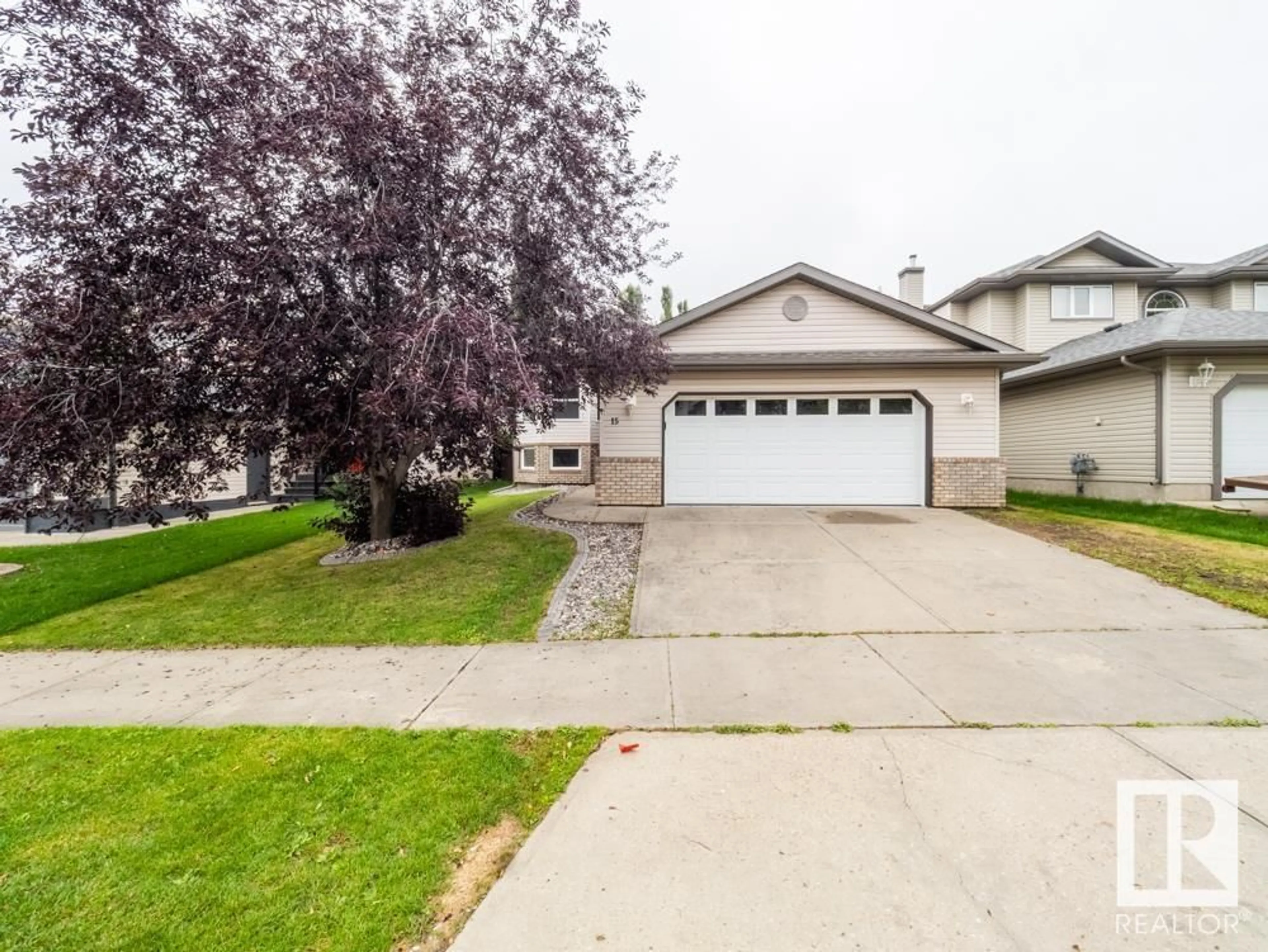 Frontside or backside of a home for 15 RUE BOUCHARD, Beaumont Alberta T4X1N5
