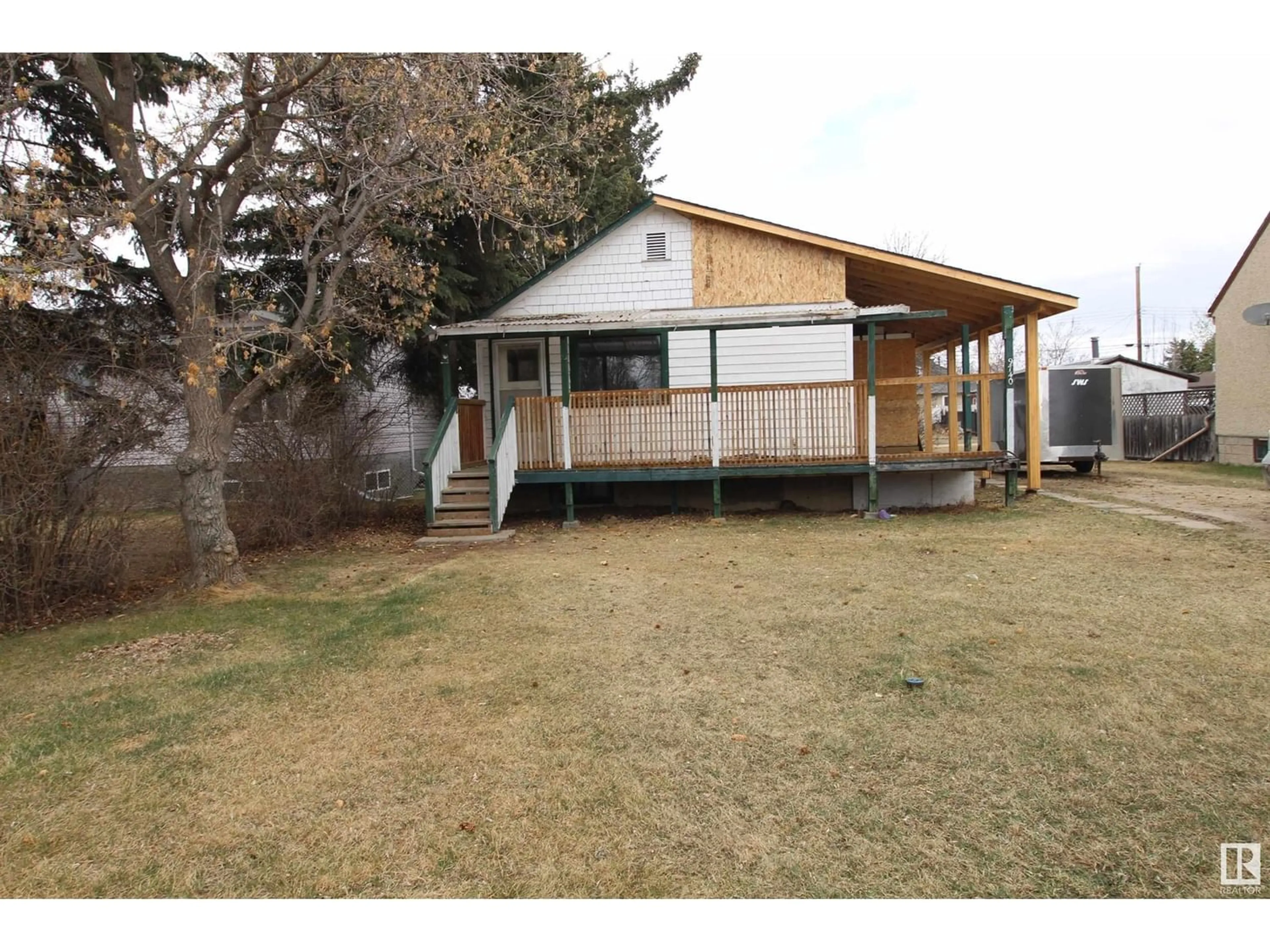 Frontside or backside of a home for 9740 109 ST, Westlock Alberta T7P1P9