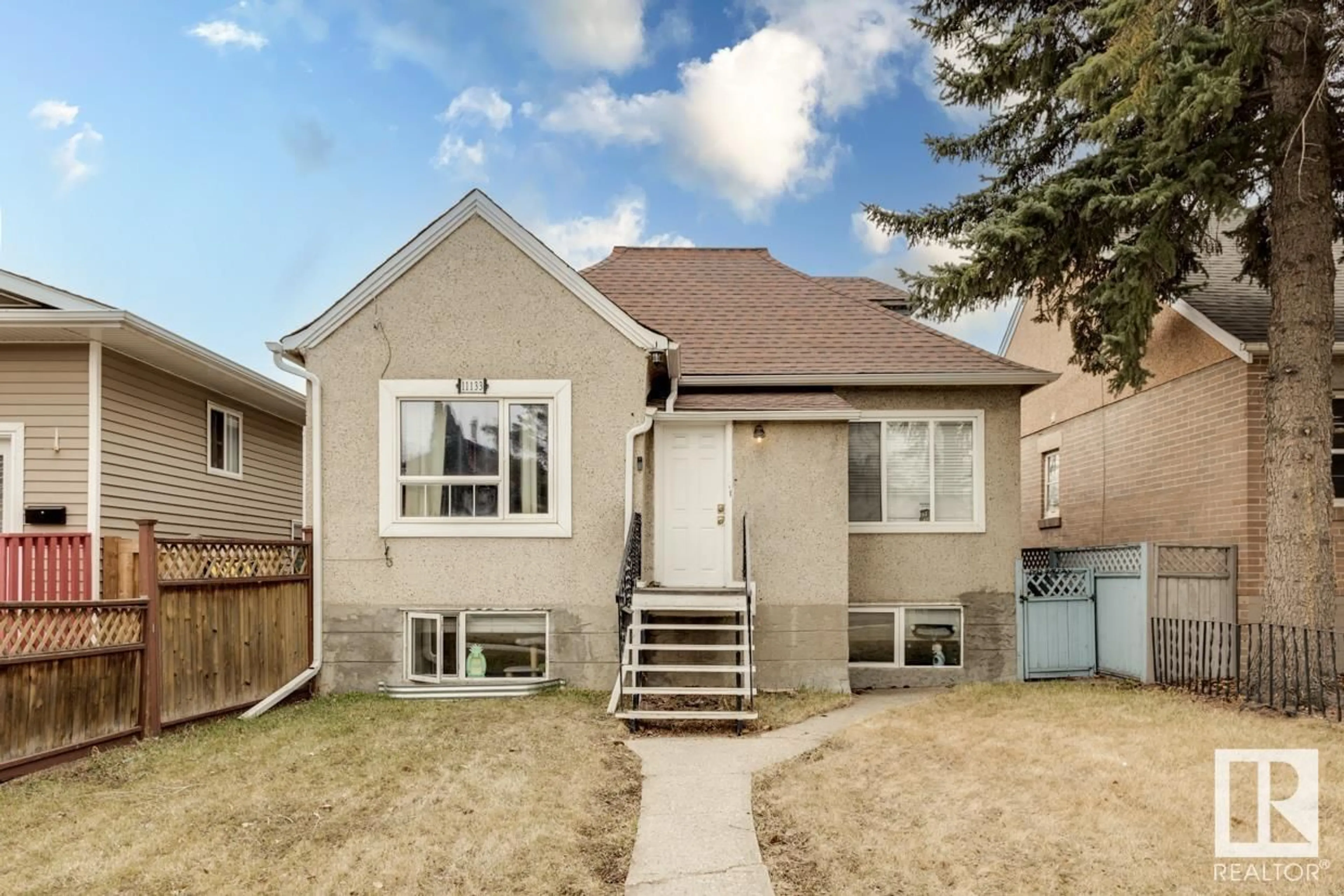 Frontside or backside of a home for 11133 96 ST NW, Edmonton Alberta T5G1S8