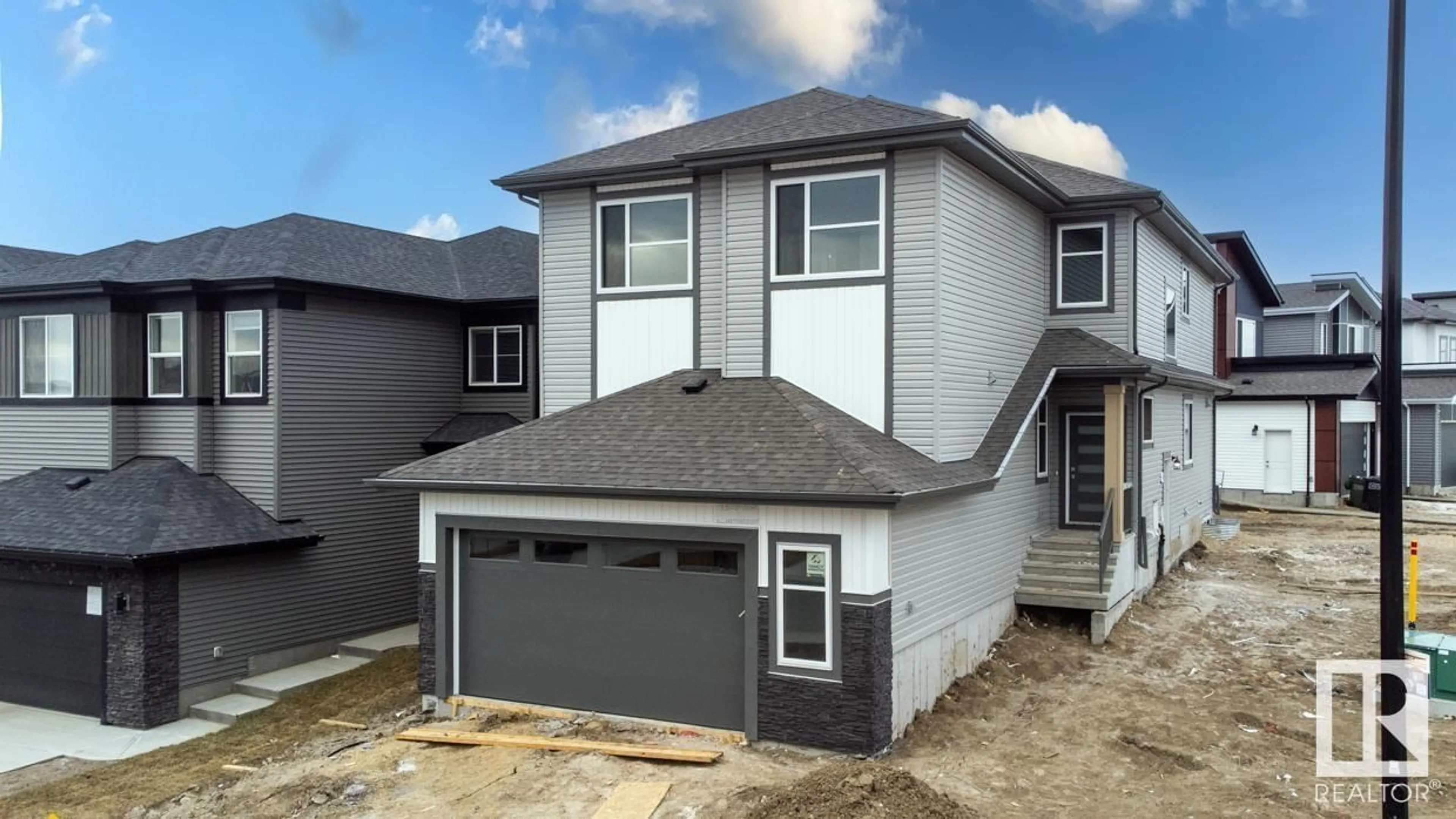 Frontside or backside of a home for 1303 15 ST NW, Edmonton Alberta T6T2S7