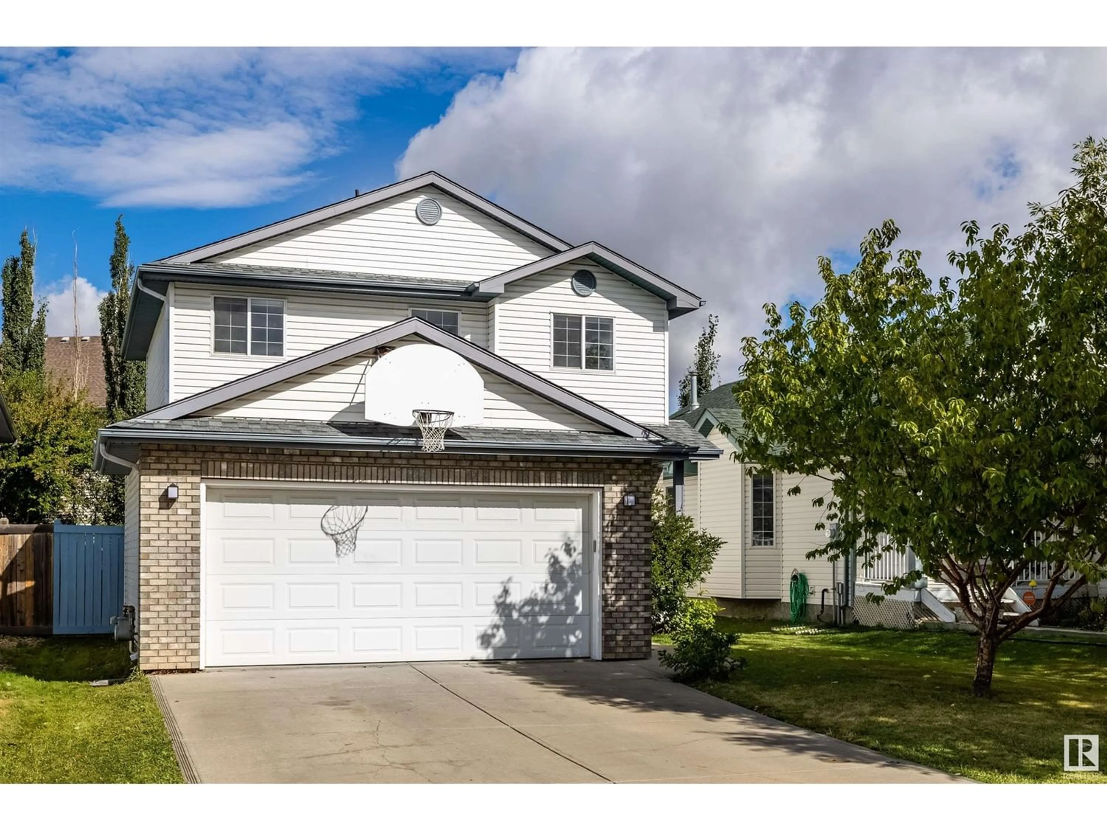 Frontside or backside of a home for 10312 180 AV NW, Edmonton Alberta T5X5Z7