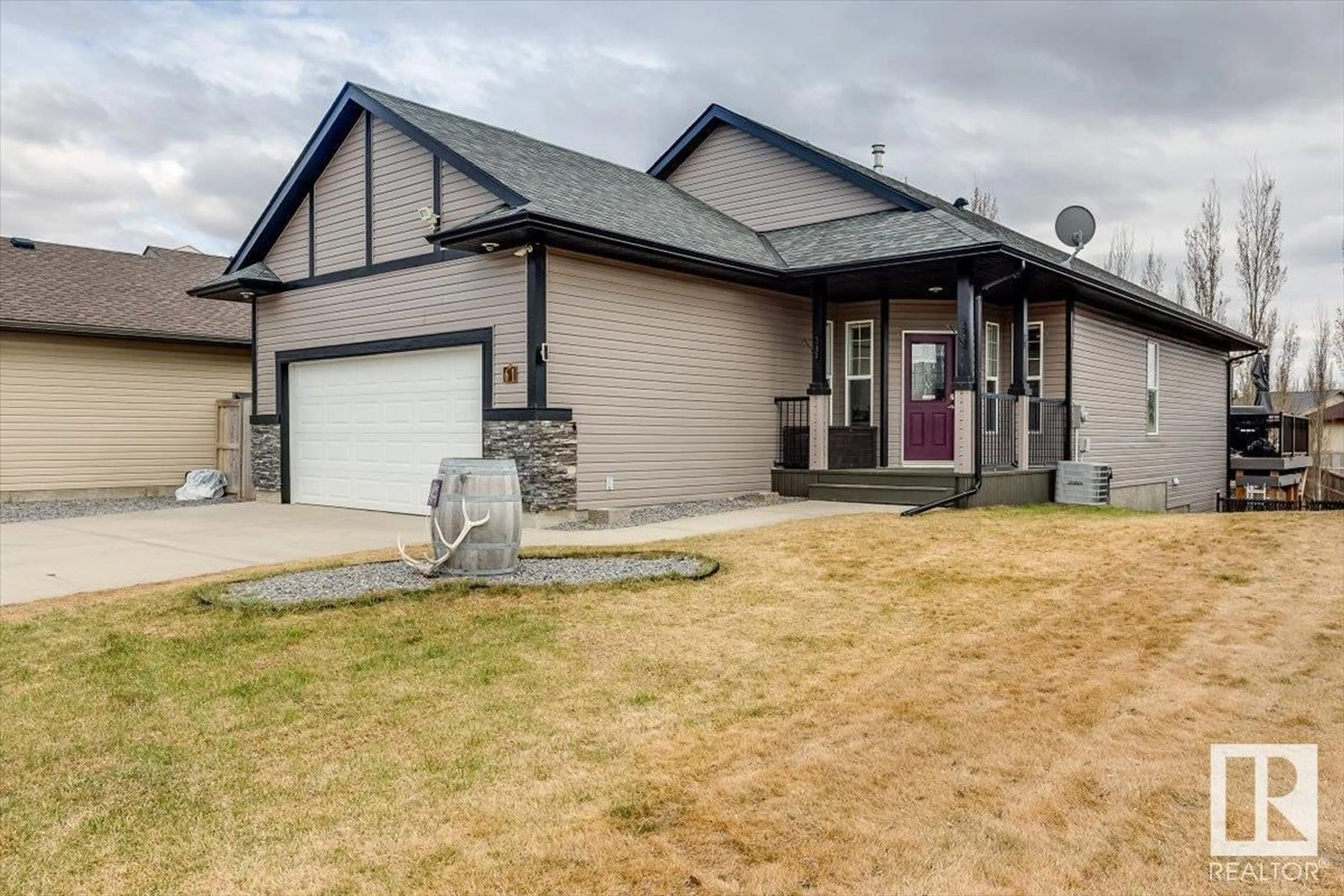 Frontside or backside of a home for 61 Burris PT, Lacombe Alberta T4L0A2