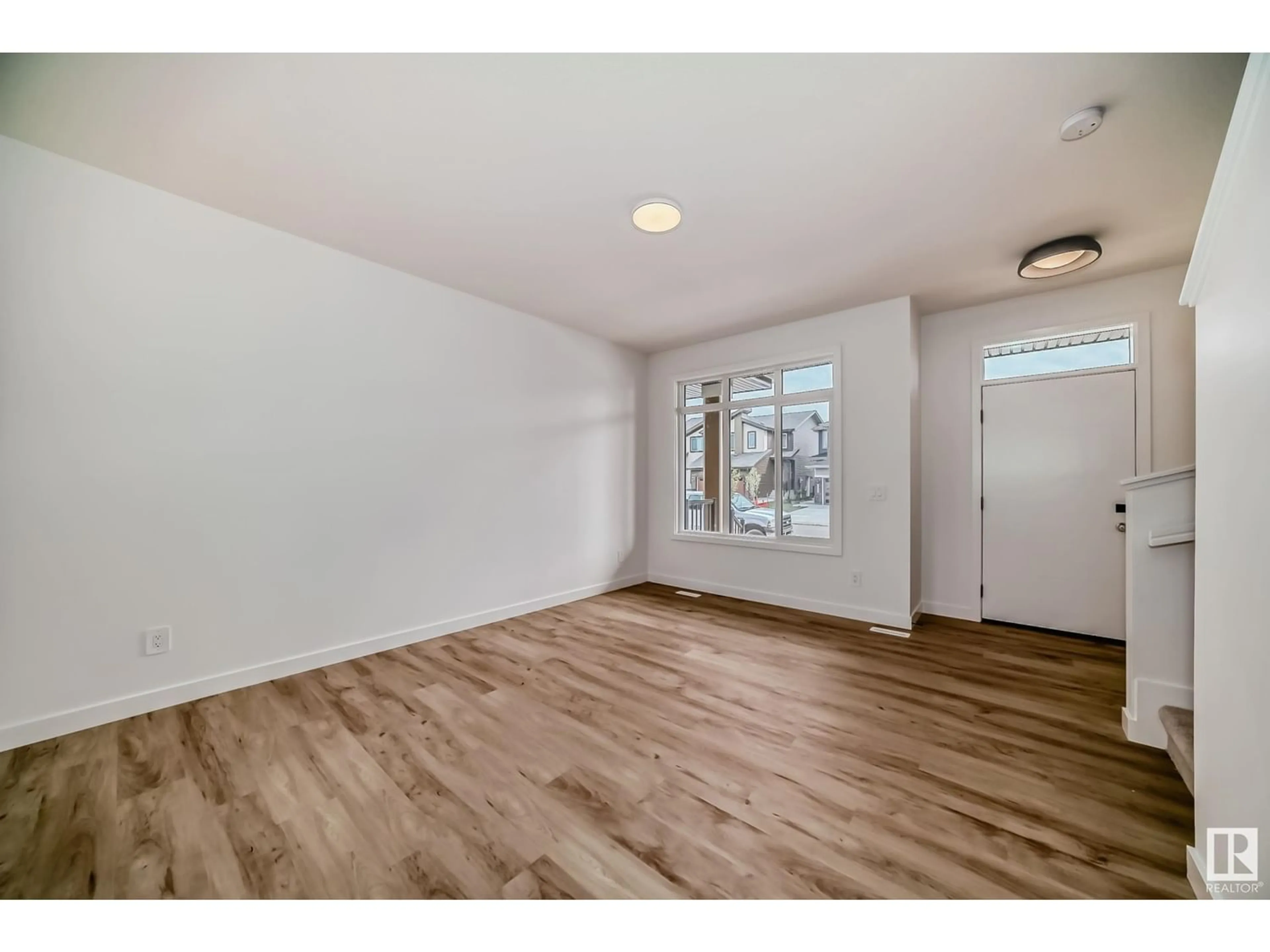 A pic of a room, wood floors for 3342 168 ST SW SW, Edmonton Alberta T6W5M2