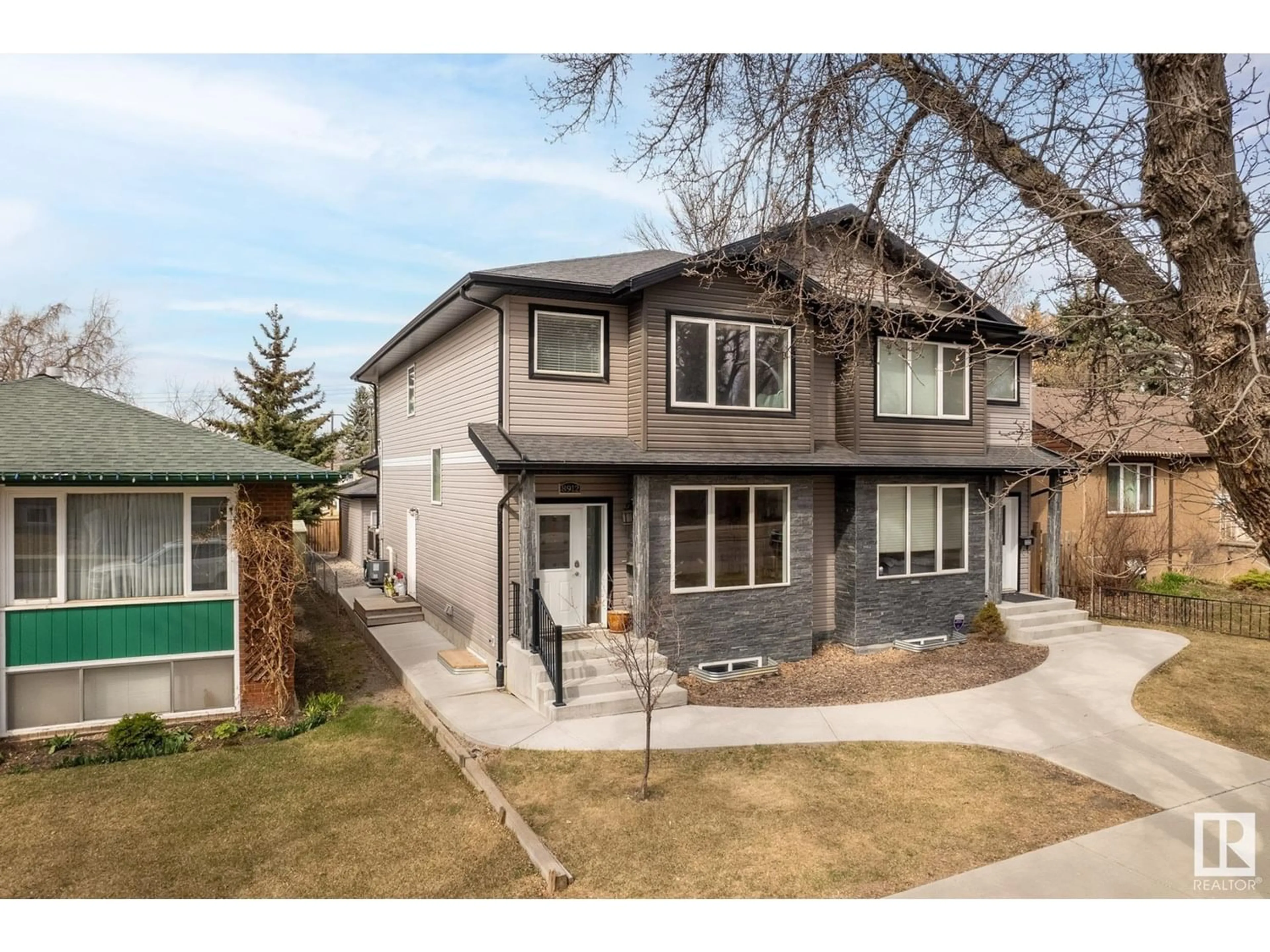 Frontside or backside of a home for 8912 88 AV NW, Edmonton Alberta T6C1L8