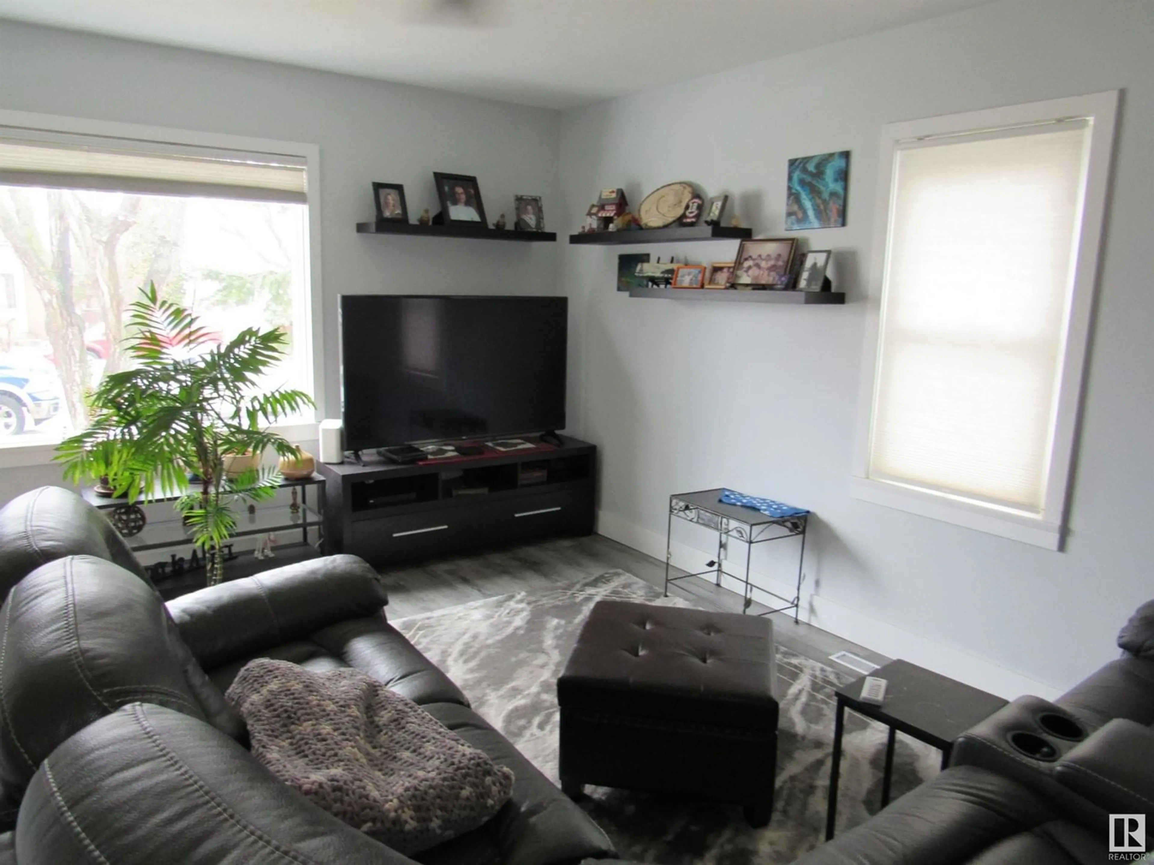 Living room for 5121 52nd Street, Barrhead Alberta T7N1E9