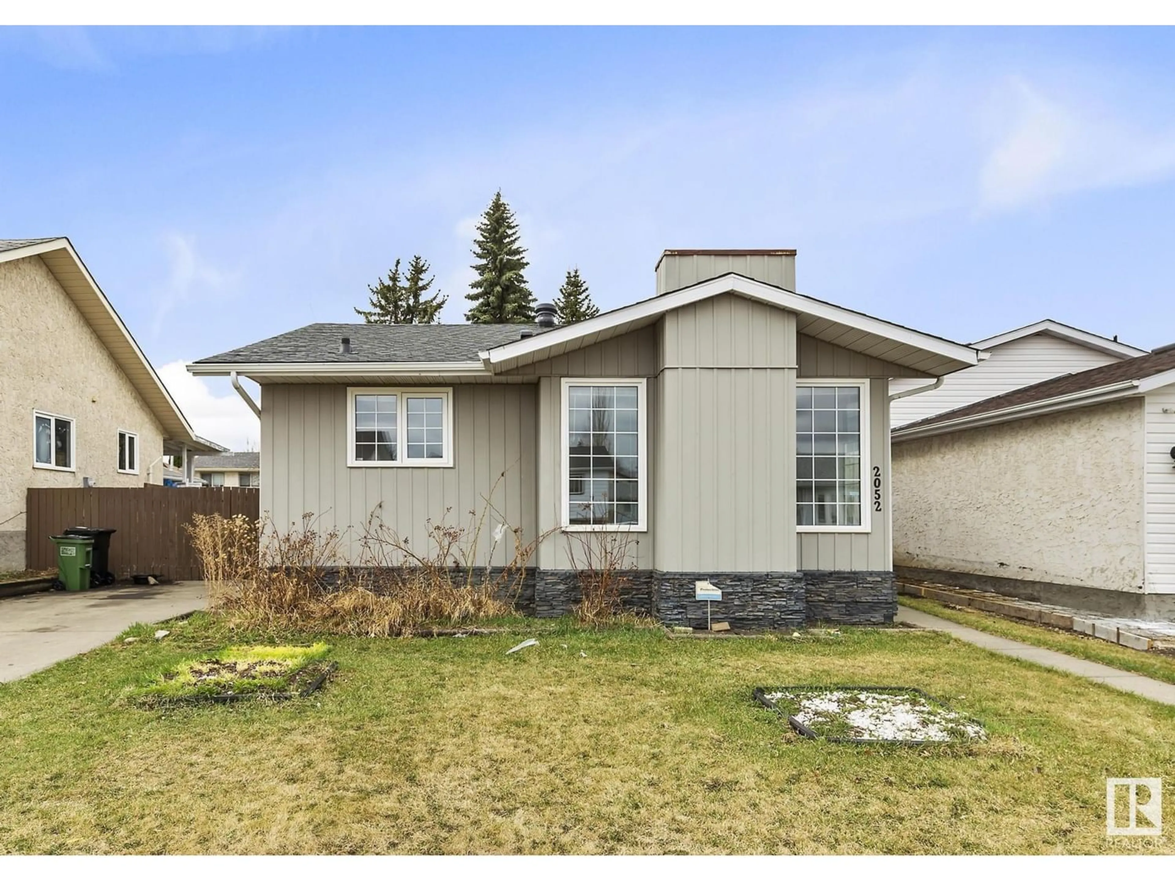 Frontside or backside of a home for 2052 48 ST NW, Edmonton Alberta T6L2W6