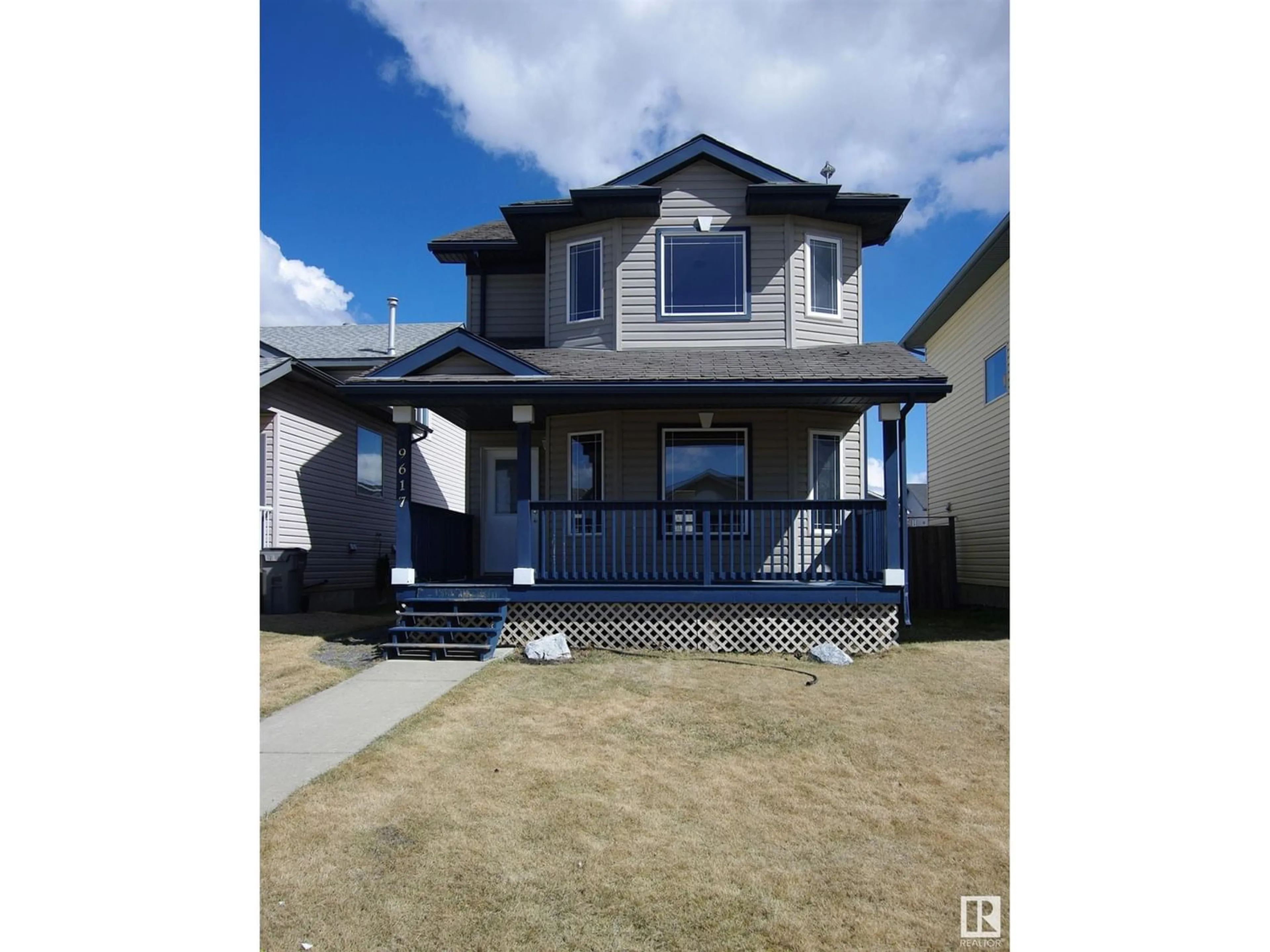 Frontside or backside of a home for 9617 90A ST, Grande Prairie Alberta T8X1T2