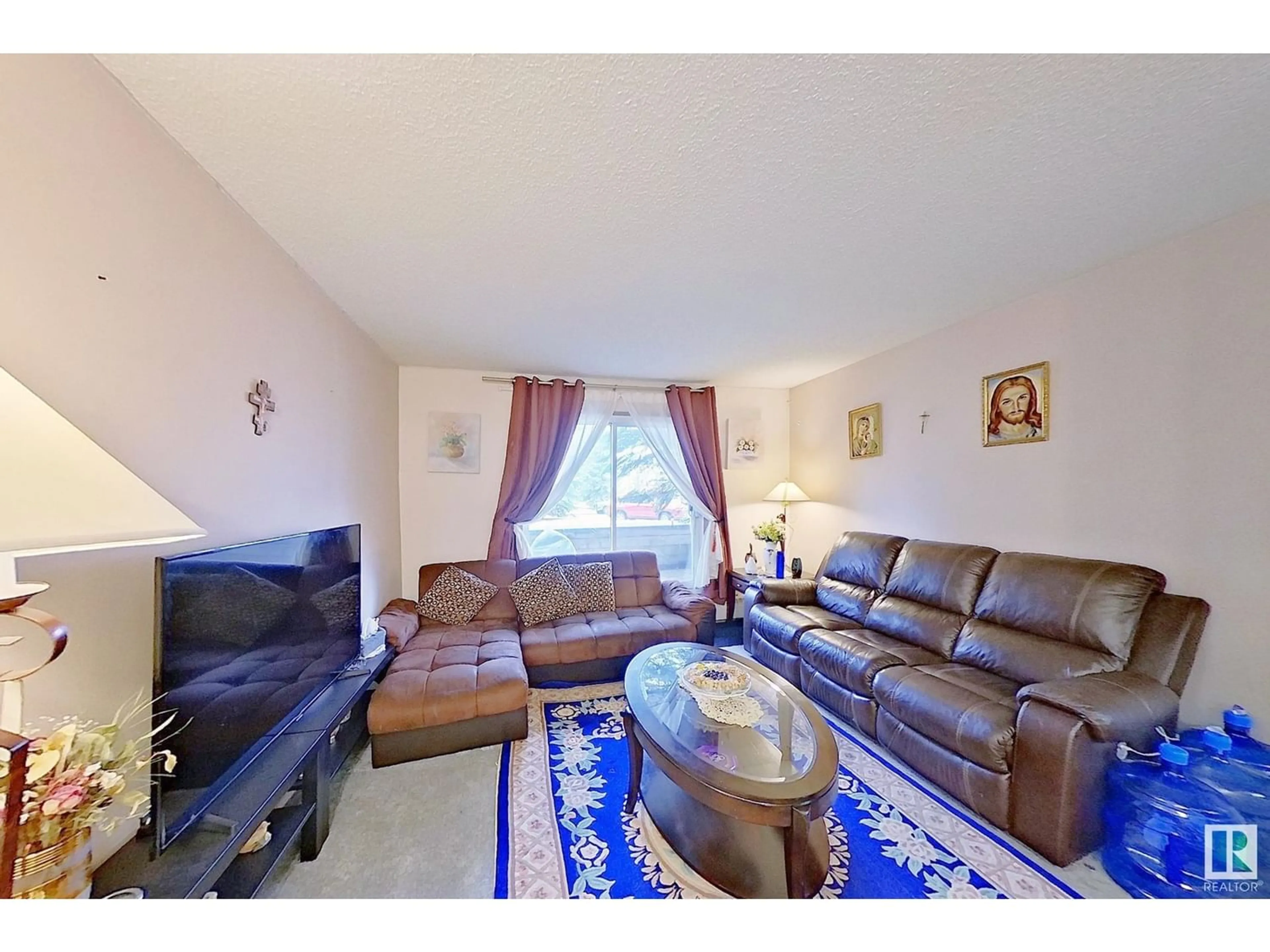 Living room for #107 2508 50 ST NW, Edmonton Alberta T6L6X9