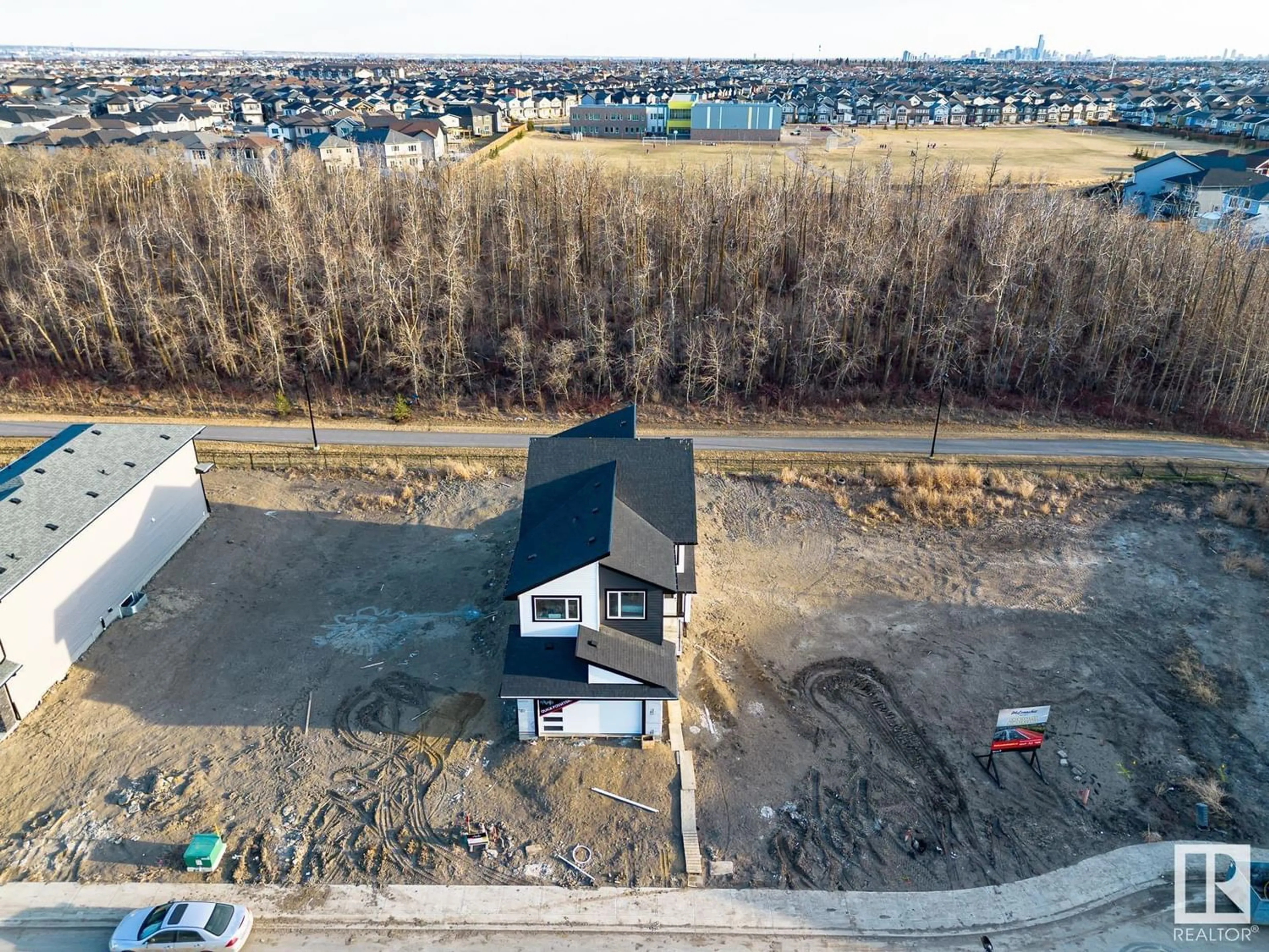 Frontside or backside of a home for 6335 175 AV NW, Edmonton Alberta T5Y4H2