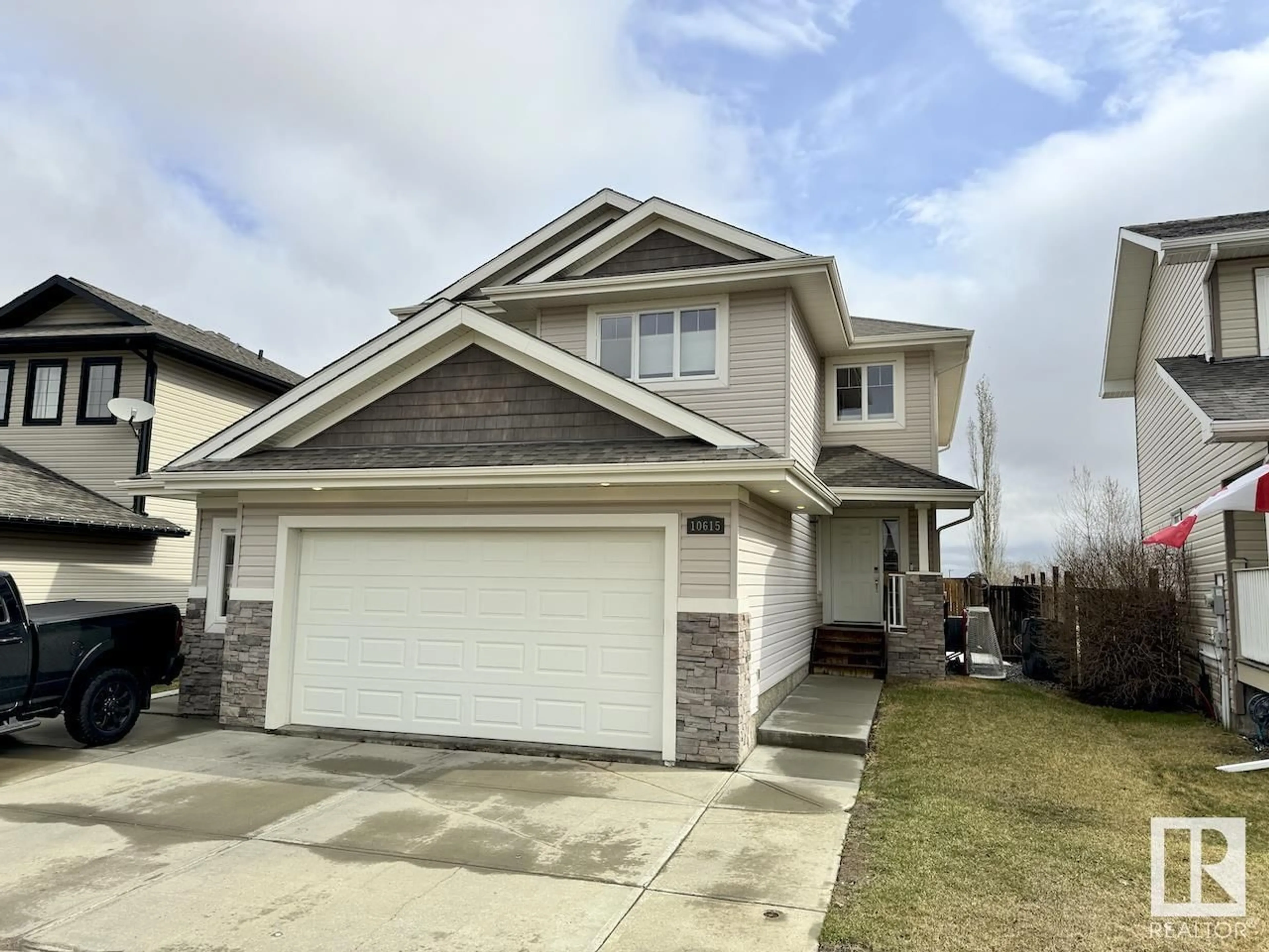 Frontside or backside of a home for 10615 95 ST, Morinville Alberta T8R0A1