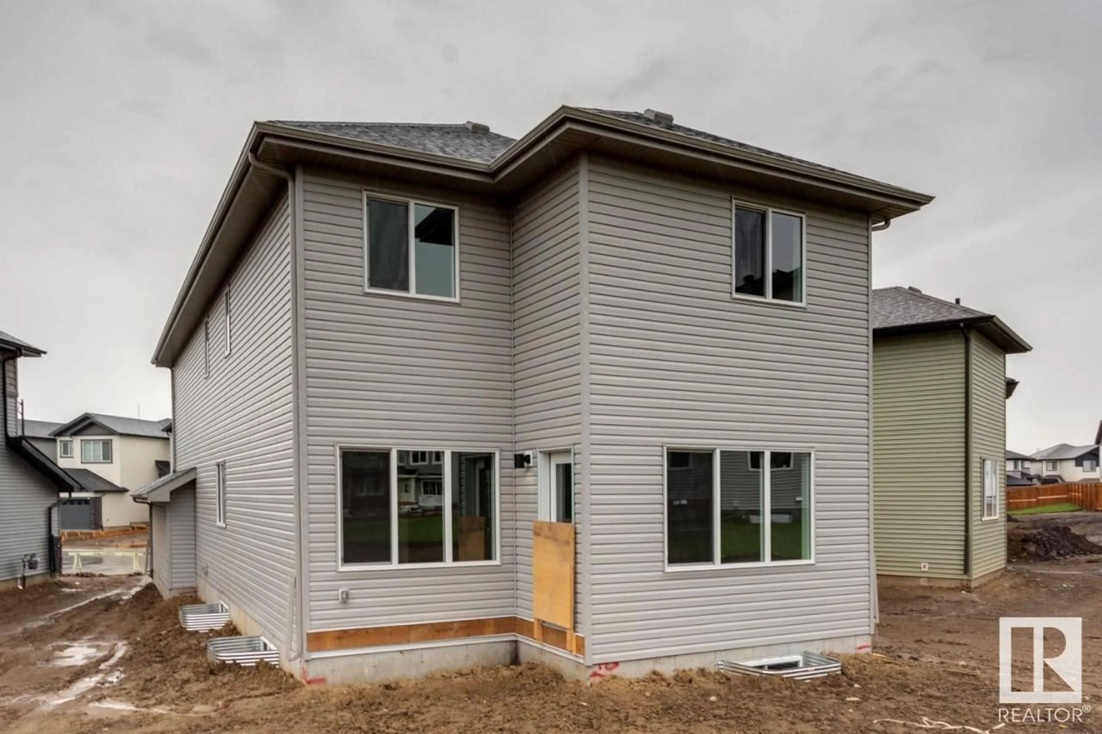 Frontside or backside of a home for 1237 16A AV NW, Edmonton Alberta T6T2V1