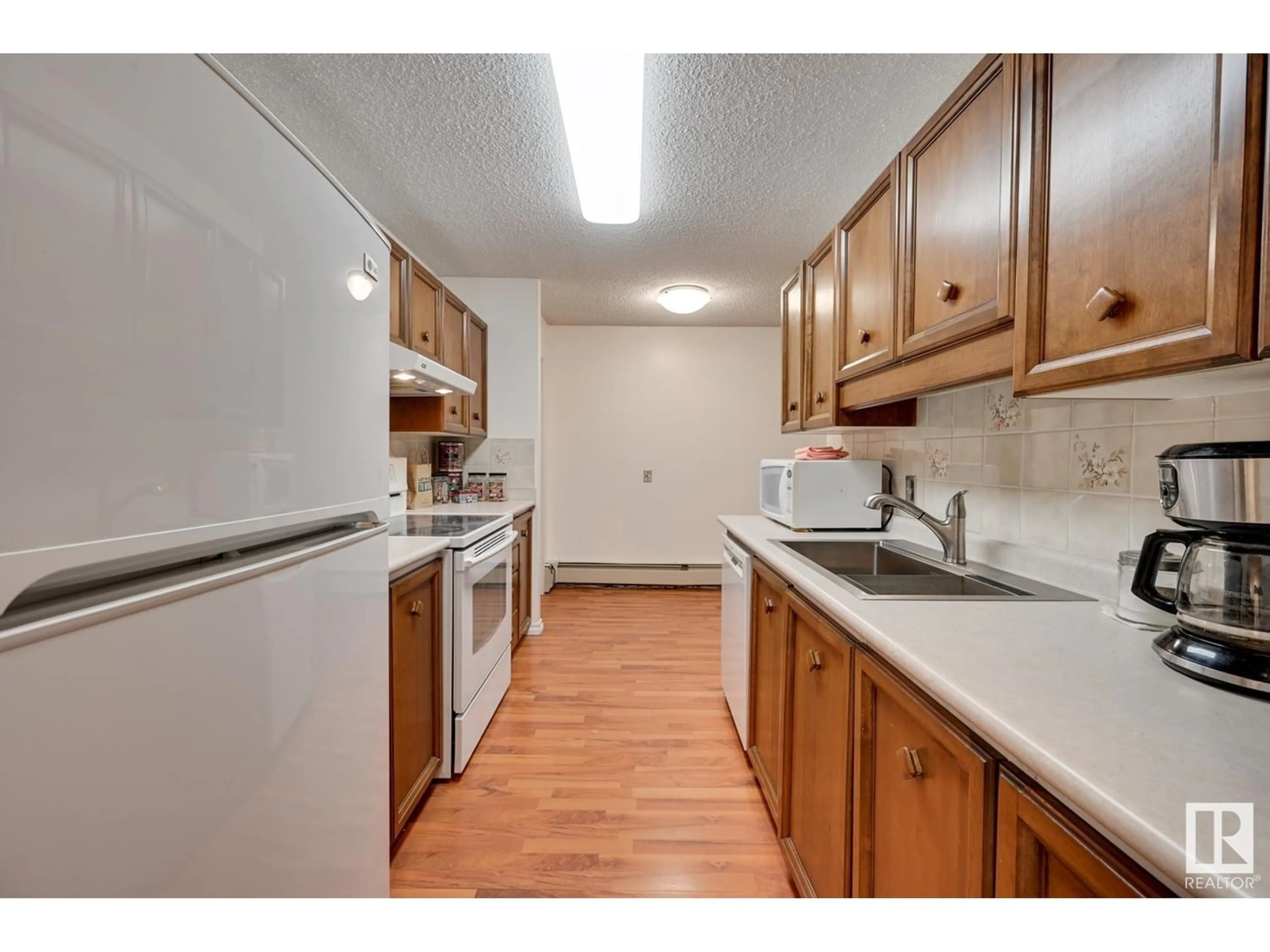 Standard kitchen for #102 8220 JASPER AV NW, Edmonton Alberta T5H4B6