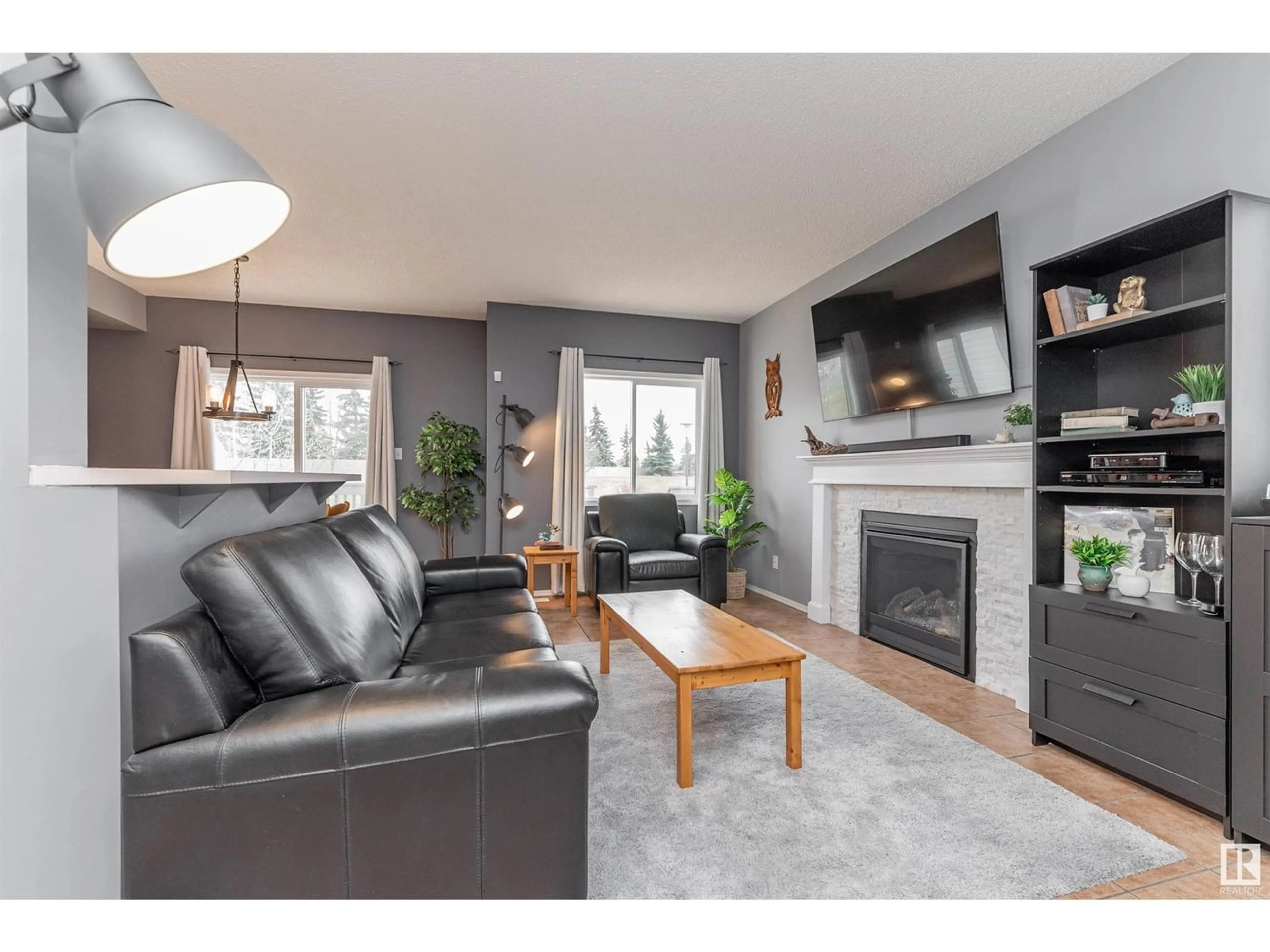 Living room for #23 843 YOUVILLE DR W NW, Edmonton Alberta T6L6X8